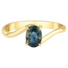 Teal Sapphire Engagement Ring