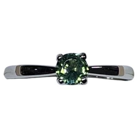 Teal sapphire gemstone solitaire ring in 18ct white