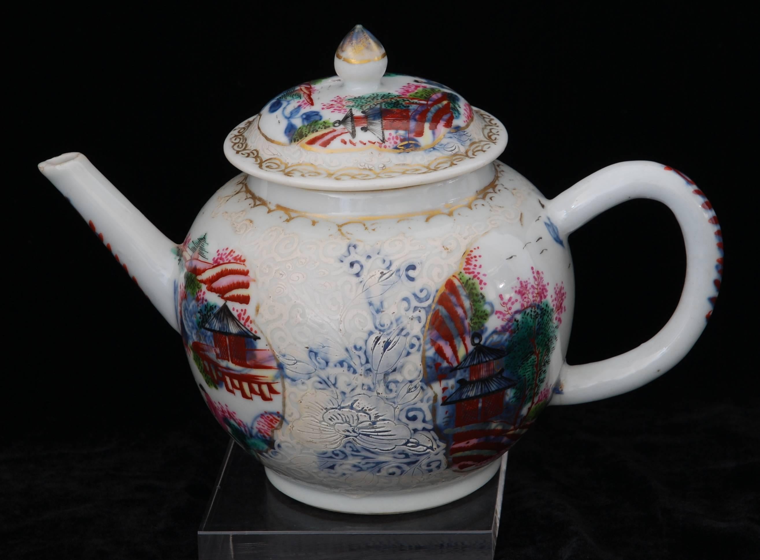 Chinese export porcelain teapot with underglaze blue decoration; decorated for the London market in the James Giles workshop with the Stag Hunt pattern.

This pot takes us back to the start of the English porcelain trade, when the London
