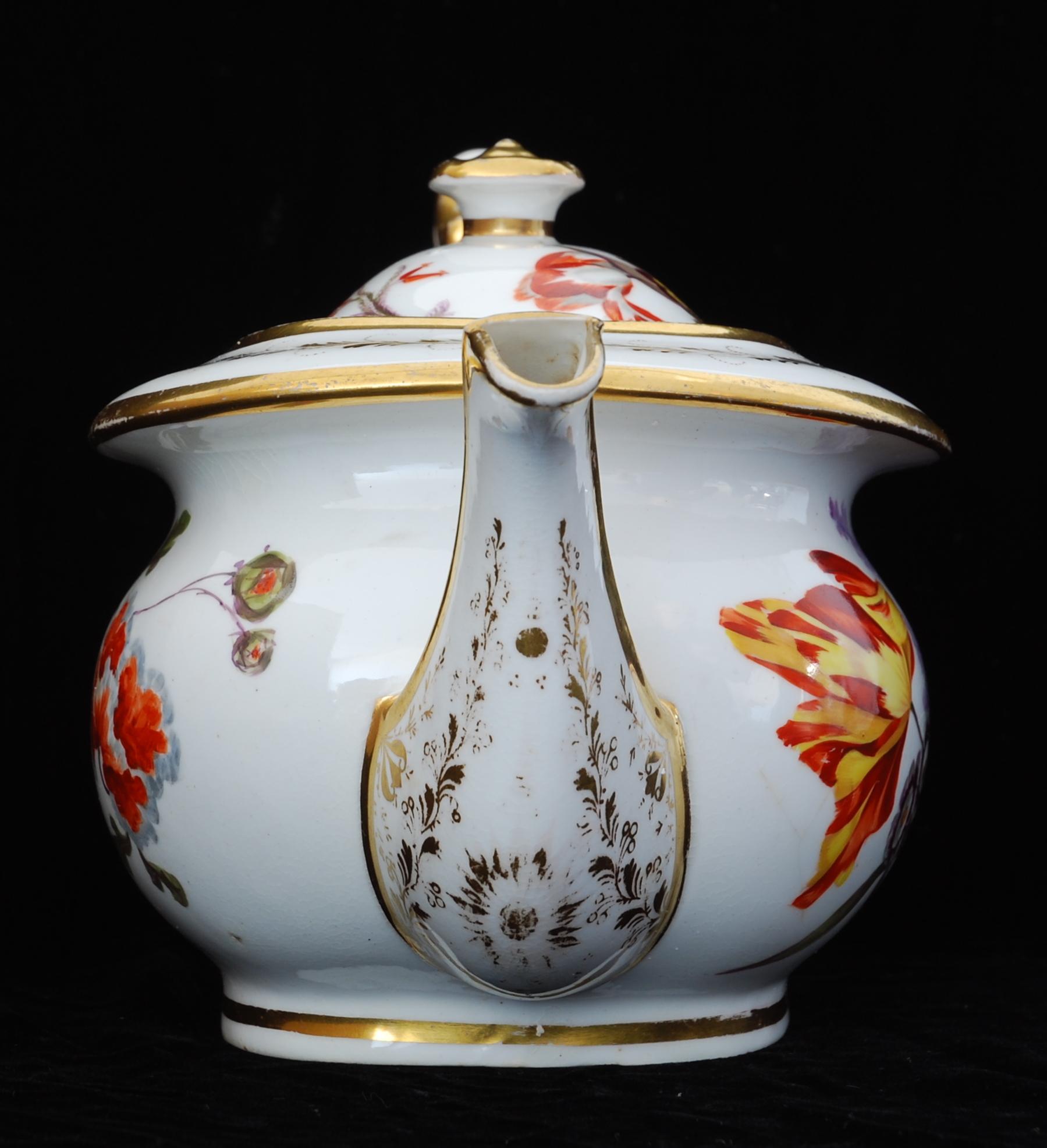 An exceptionally rare teapot, sugar and creamer in Nantgarw’s superb soft-paste porcelain. Each piece is gilded and decorated in one of the London workshops with superb flower painting, probably by Moses Webster.

The Nantgarw factory lasted only