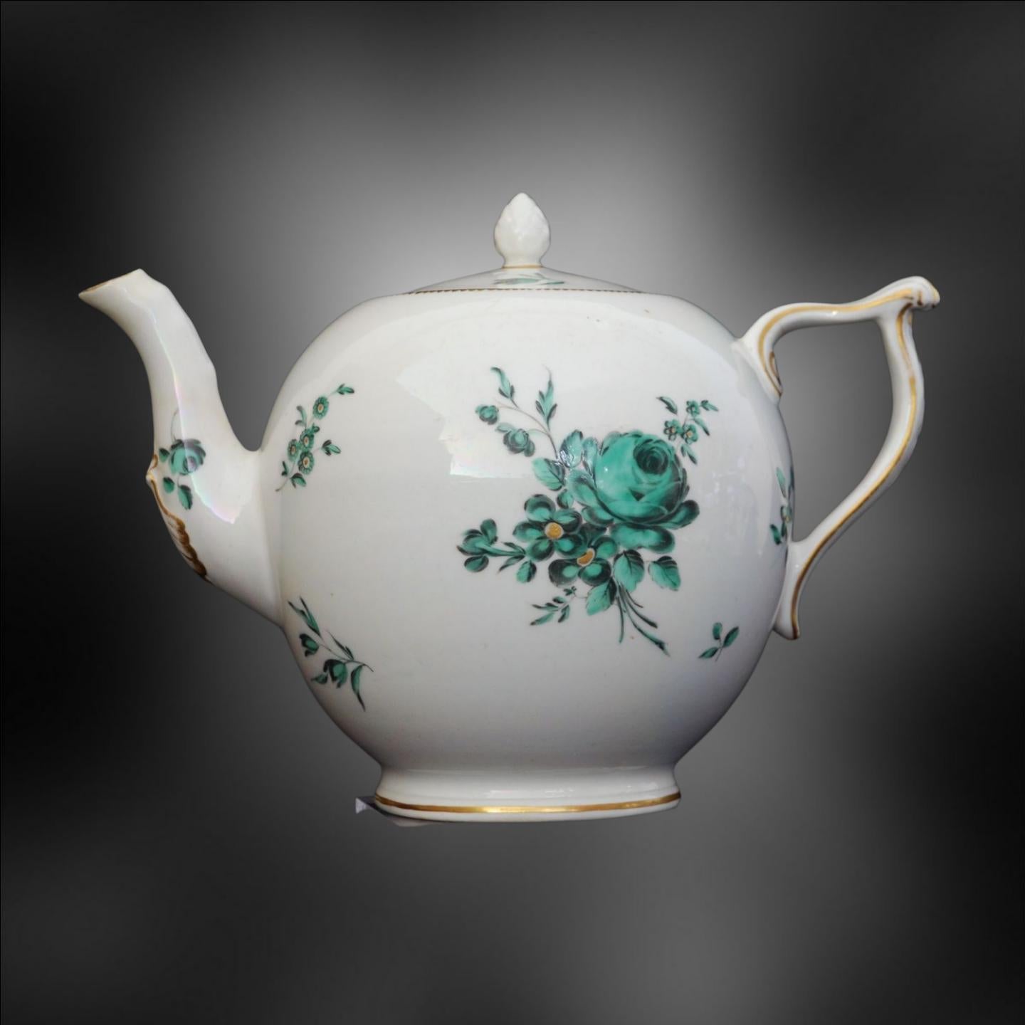 A gadrooned, canon-ball shape teapot, decorated with typical sprays of natural flowers. The shape and decoration are both in imitation of Meissen.

The Derby Porcelain Works, now known as the Royal Crown Derby Porcelain Company, is a British