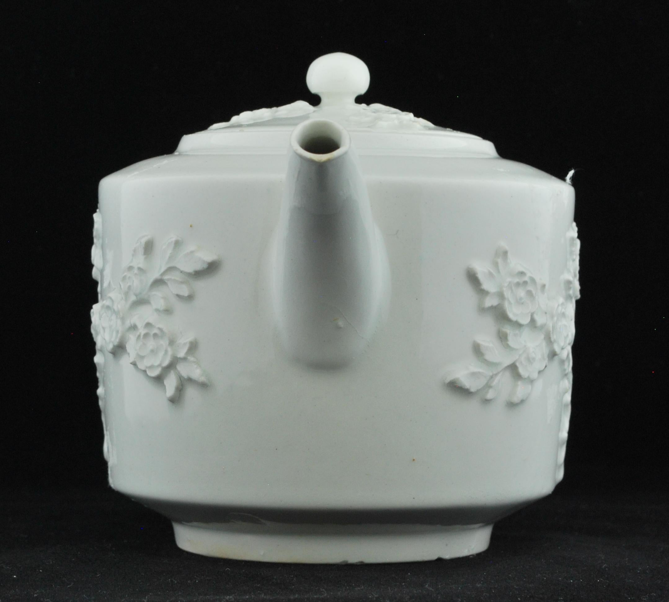 Drum-shape teapot with applied double-prunus decoration, in imitation of the Chinese. Pots of this form and date are rare, and this example is unusual in the quality of its body and glaze and the lavishly applied prunus decoration.

Ceramics bills