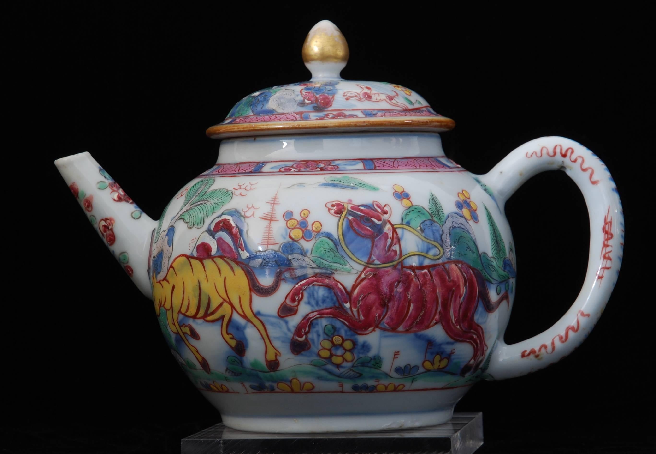 Chinese porcelain teapot decorated in under-glaze blue; decorated in (probably) London with colourful horses, a man, birds and insects.