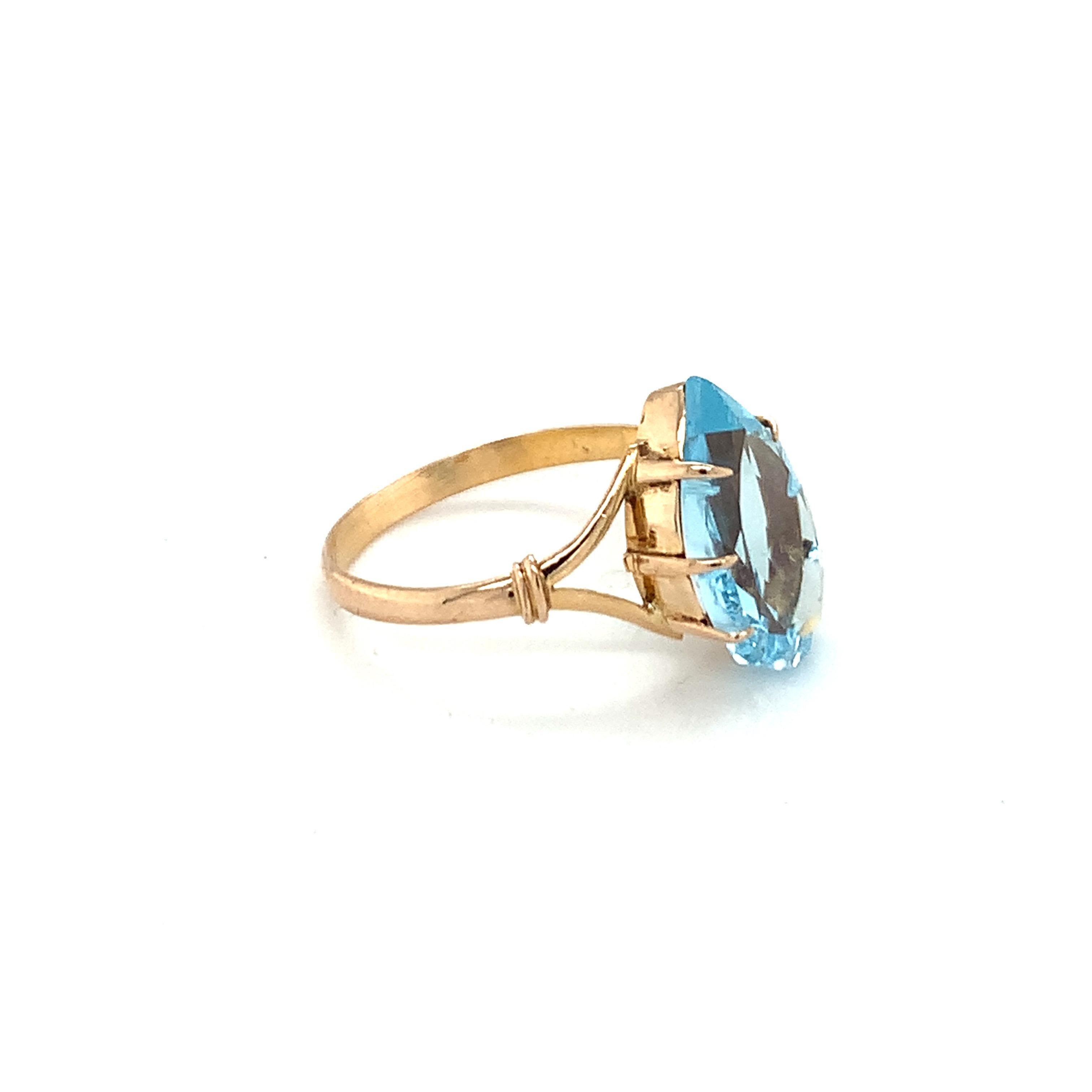 Hand cut and polished blue topaz ring is crafted with hand in 14K yellow gold. 
Ideal for daily casual wear.
Image is enlarged for a closer look
Ethically sourced natural gem stone.