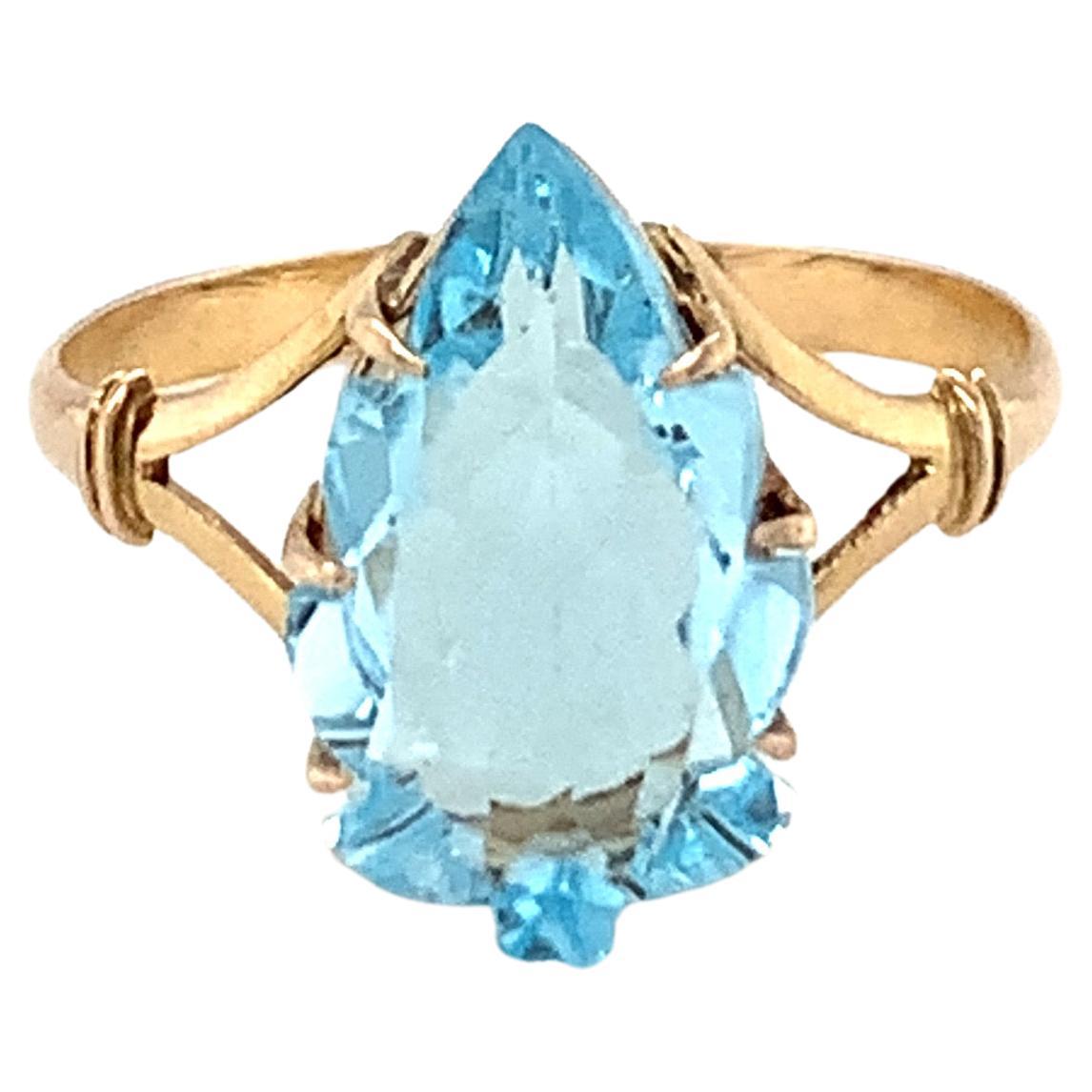 Tear Drop Blue Topaz Ring Set in 14k Yellow Gold For Sale