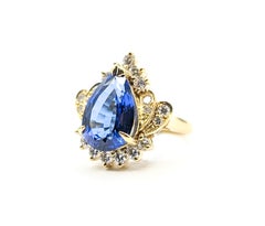 Tear Drop Tanzanite & Diamond Halo Ring in 18k Yellow Gold