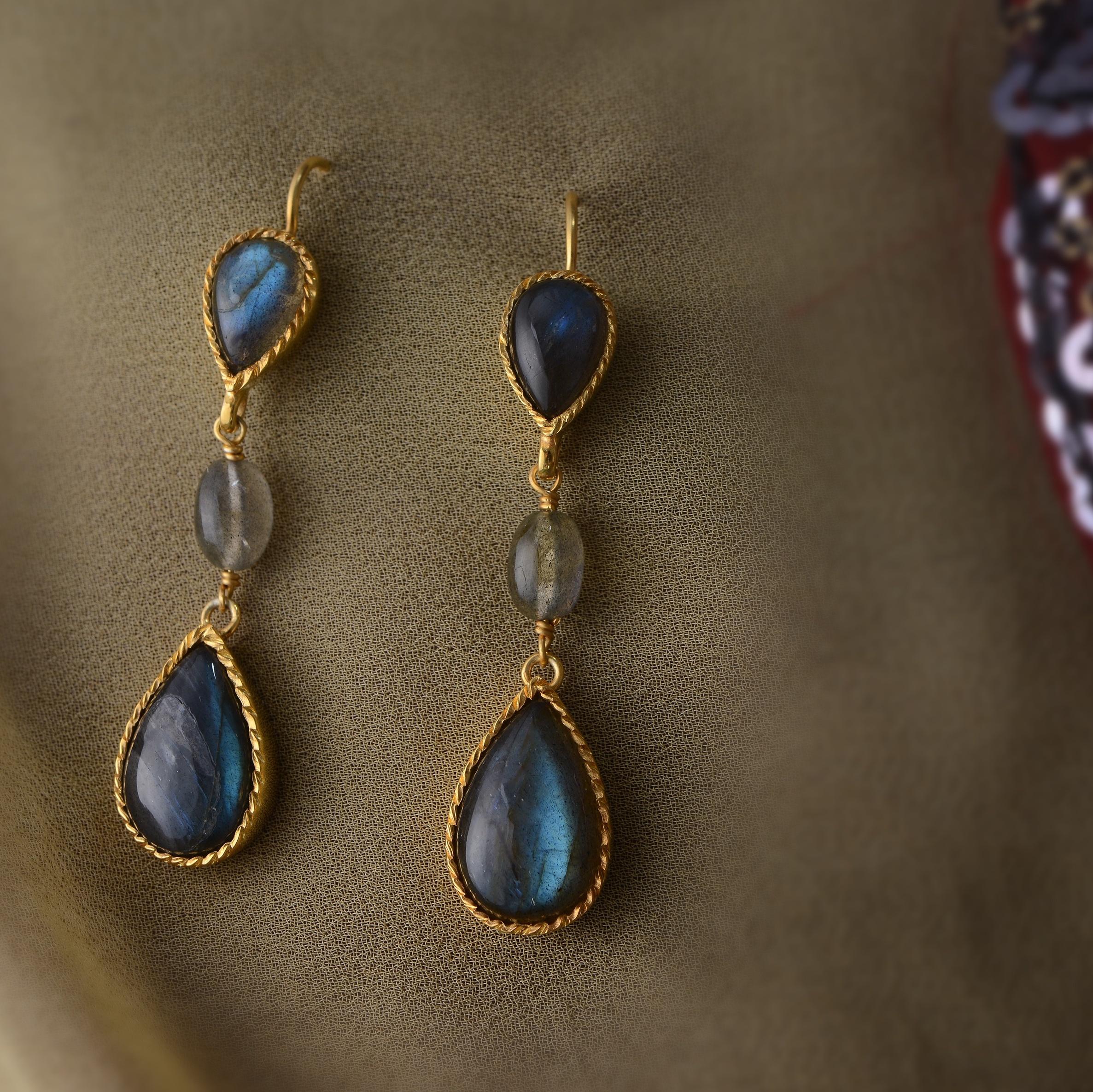 These lovely labradorite teardrop earrings have been handmade in our workshops.
Using cabochon gemstones cut especially for the earrings, they are from a limited edition and have a matching pendant and ring.
52 mm from top of earring hook x 10mm
The