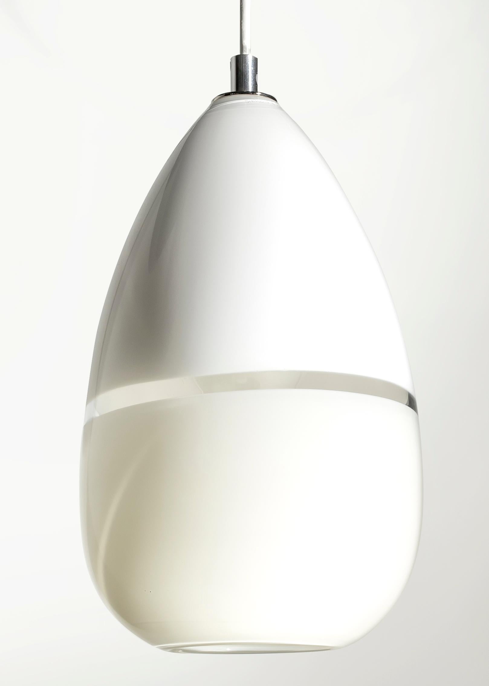 Teardrop pendant lighting, white/ivory Lattimo, hand blown glass is made to order by Siemon & Salazar
Measures: 12