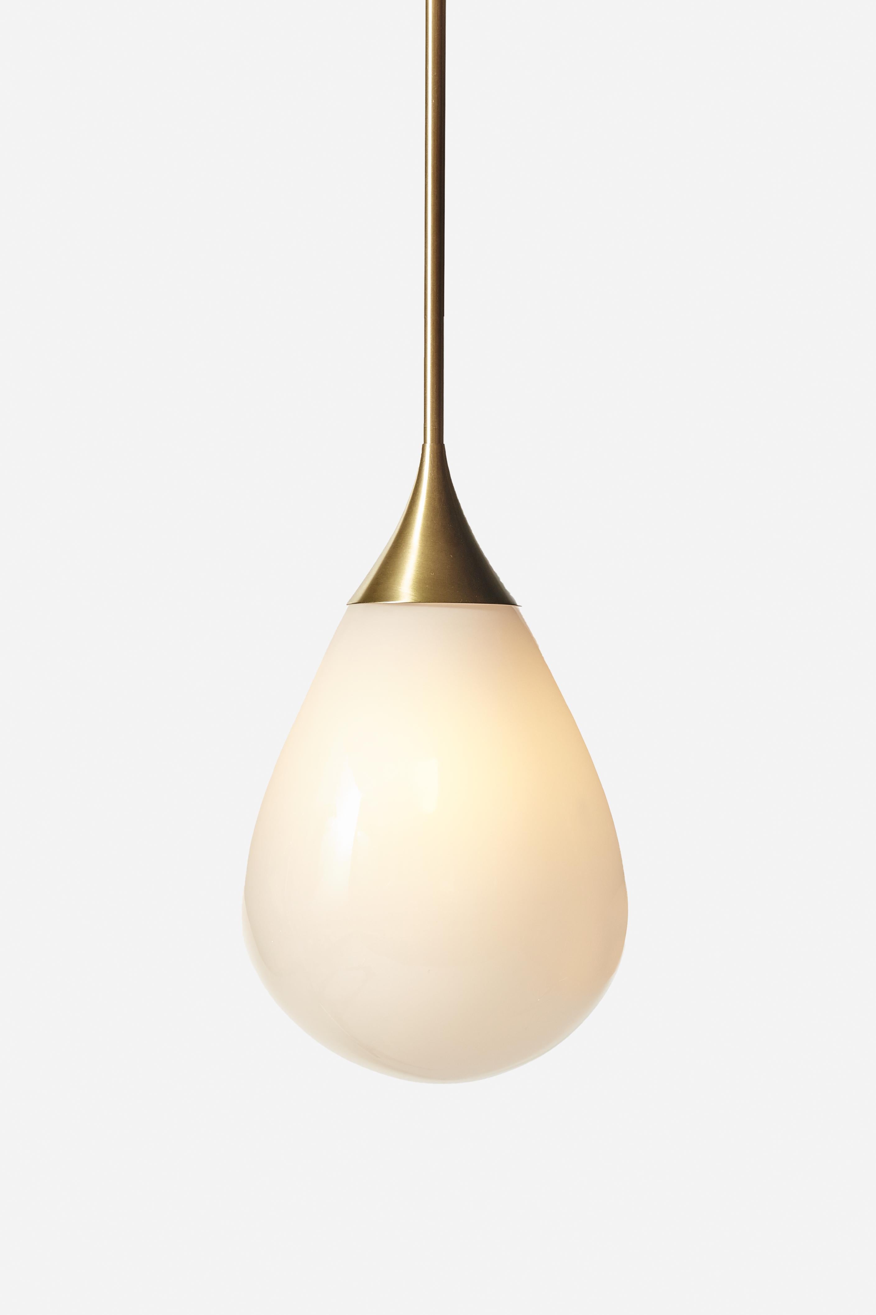 A carefully crafted, hand blown glass pendant hangs from spun brass for an elongated and elegant tear-drop shape. Also available as a cluster of three or five.

Metal finish:
Satin brass, oil-rubbed bronze, antique brass, satin nickel, antique