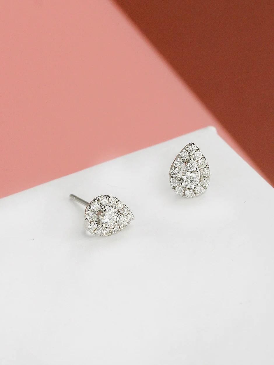 Micro pave white diamond pear shape earring, all with a high polish finish. Available in 18K White Gold.

Earring Information
Diamond Type : Natural Diamond
Metal : 18K
Metal Color : White Gold
Diamond Carat Weight : 0.60ttcw
Diamond Color Clarity :