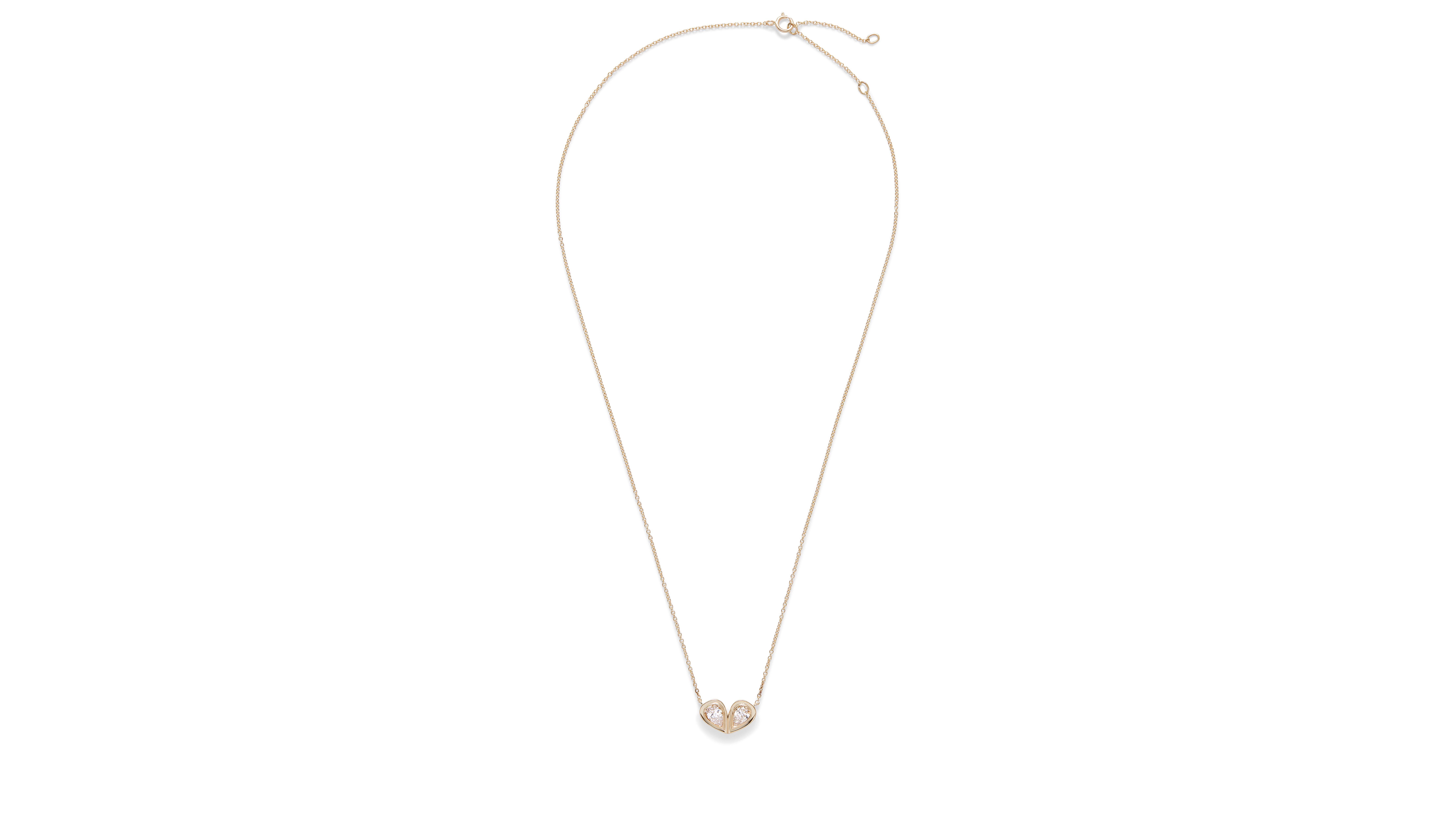 Pear shaped natural diamonds are brilliantly set with a double bezel setting to enhance the beauty of the stones.  The designers named this necklace “Tears of Joy” because this necklace is a way to remember the most beautiful moments that life has