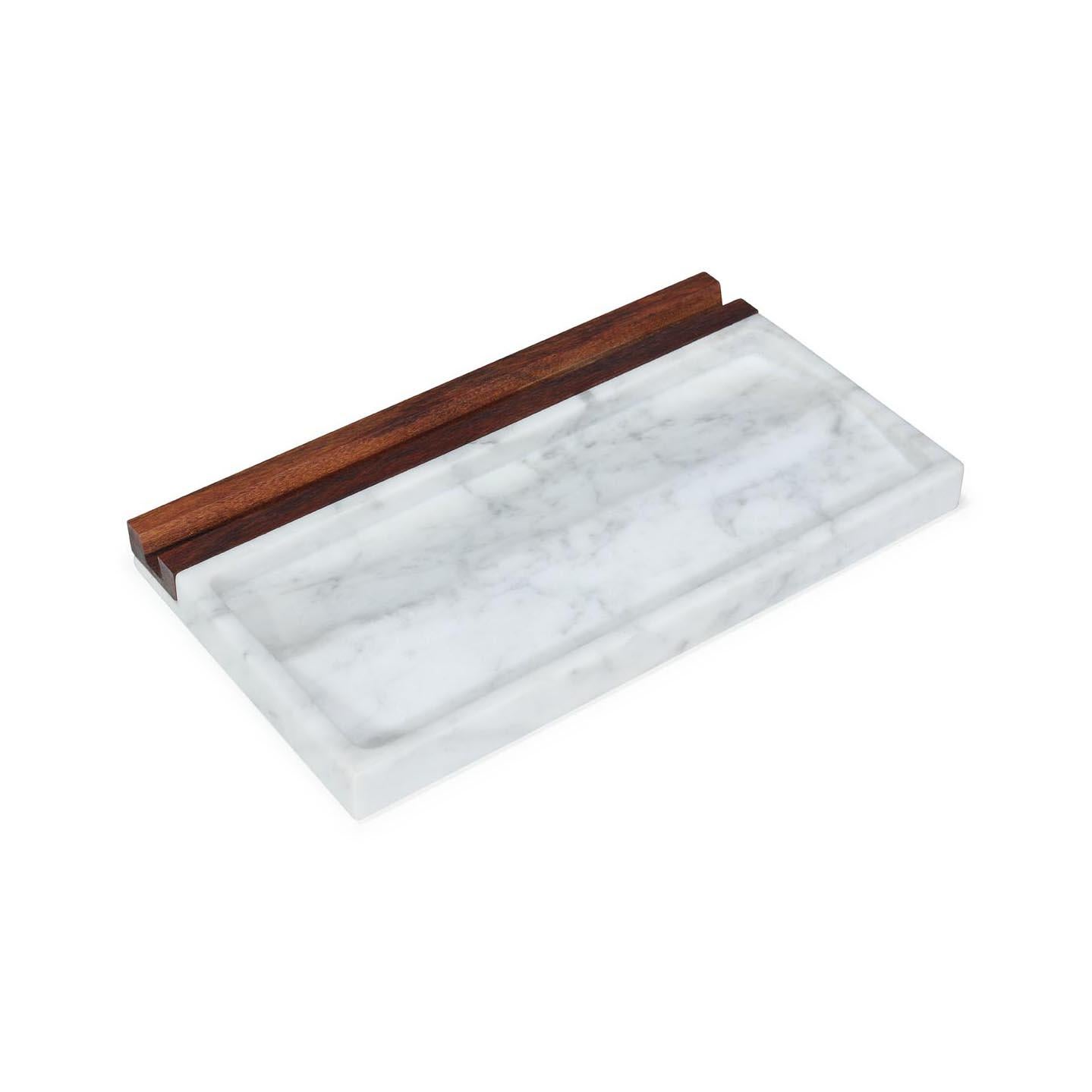 Tech tray It's not just one more office accessory.
It's THE multifunctional and stanning tray where you can put your phone, tablet, pens, clips...
Made from marble and wood leftovers in order to have a low environmental impact and promote a