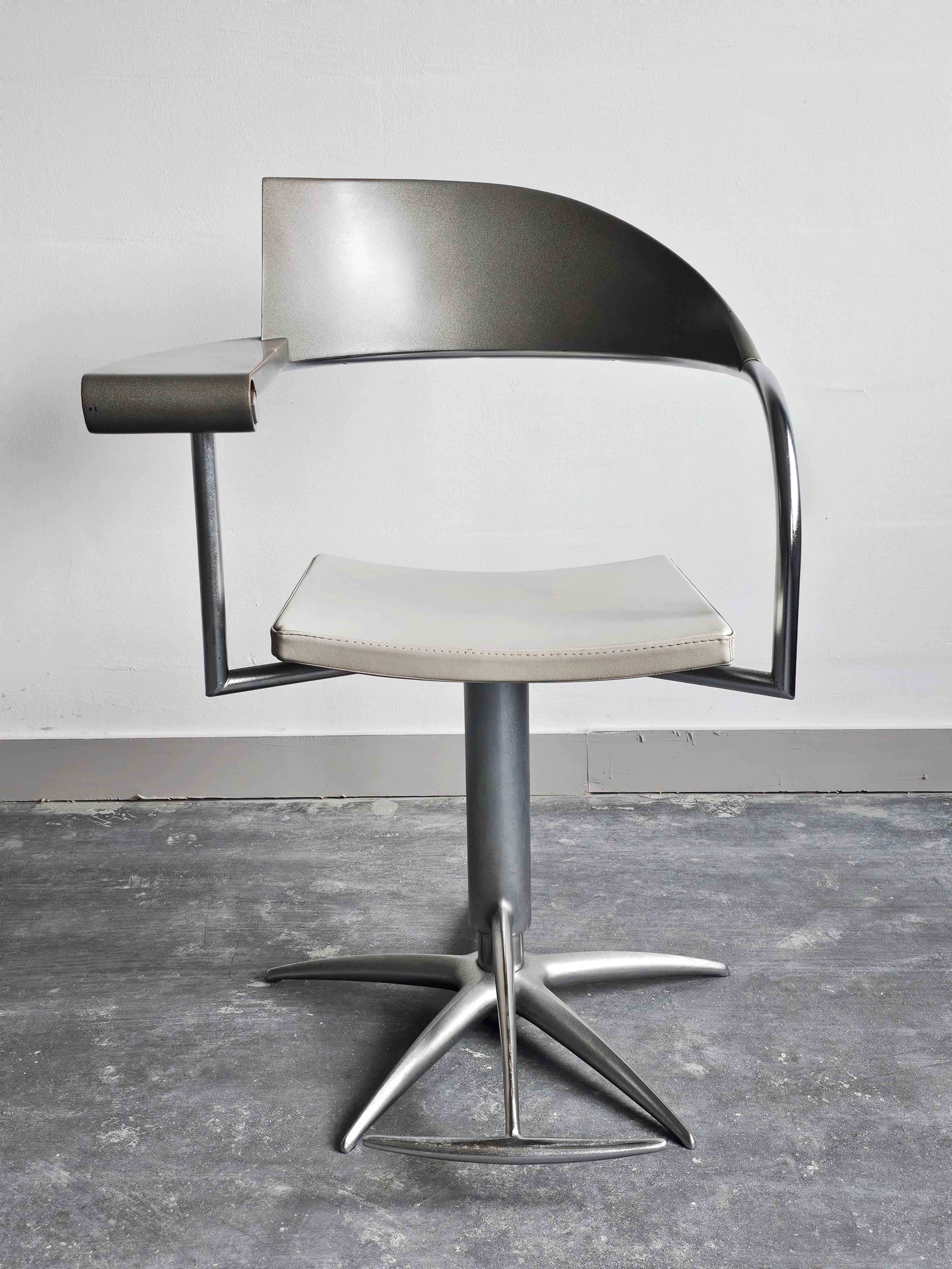 In this listing you will find 4 exceptionally rare swivel barber chairs, called Techno chairs, designed by Philippe Starck for L'Oreal.

These chairs represent the peek of postmodern design with astonishing lines and exquisite craftsmanship.  Each