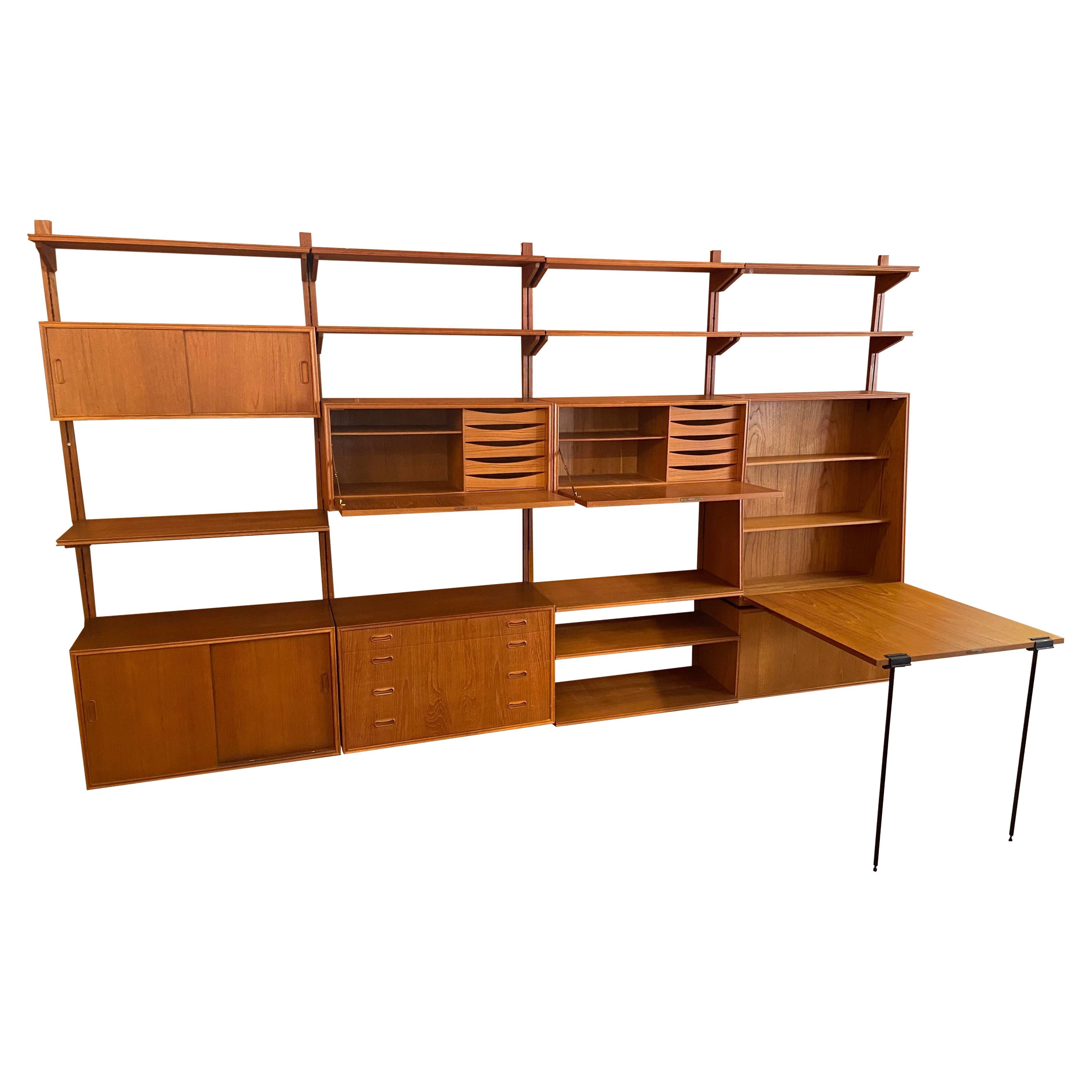 Libreria a muro Teck, design danese nello stile di Poul Cadovius, circa 60 anni. in vendita