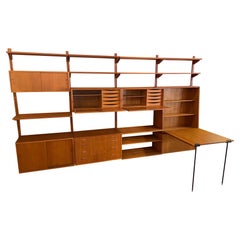 Vintage Teck wall bookcase, Danish design in the style of Poul Cadovius, Circa 60.
