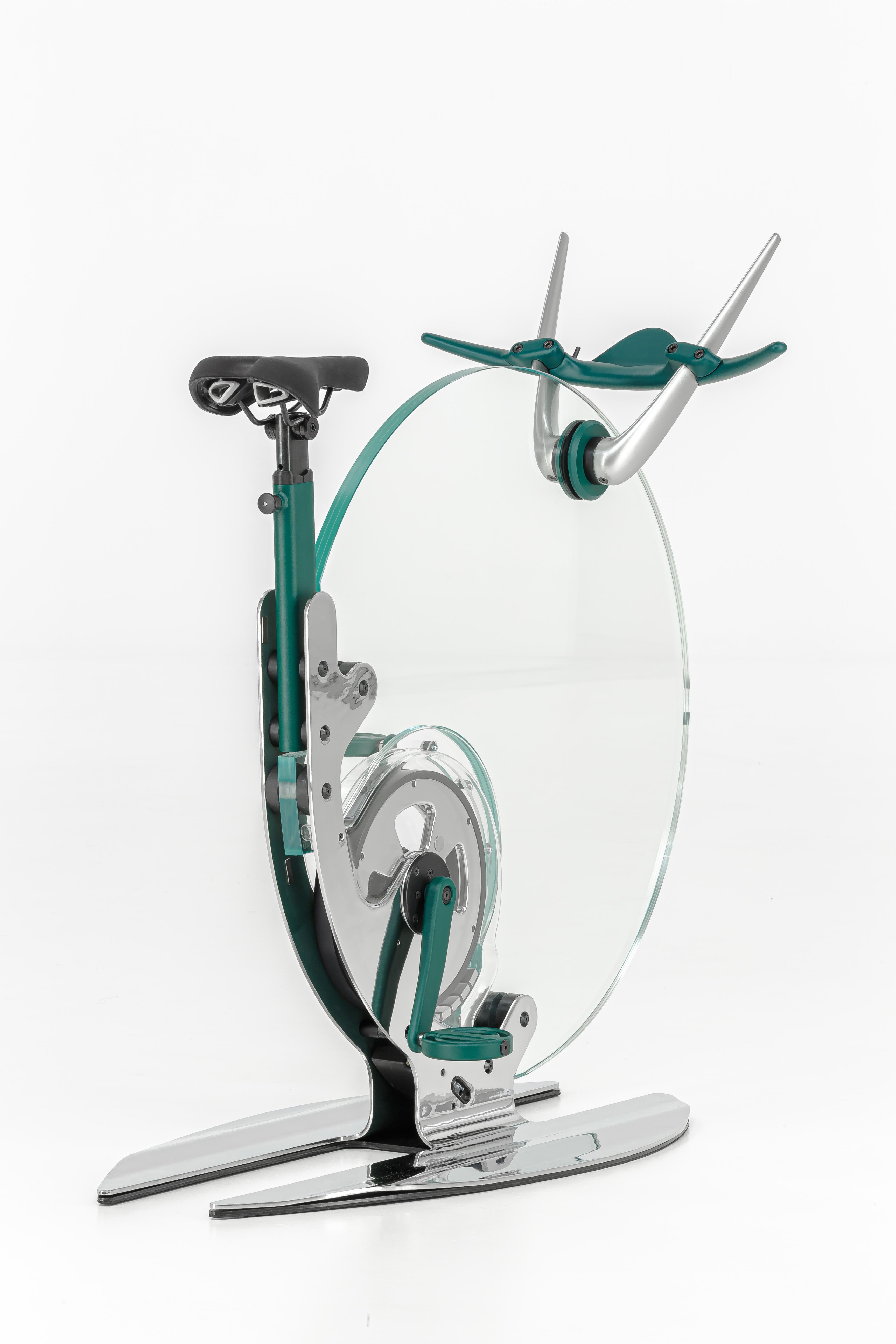 Ciclotte exercise bike designed by Luca Schieppati and Gianfranco Barban for Teckell is a part of the fitness collection. The bike is built with a crystal disk and either a chrome or black carbon frame. Through extensive research the ergonomics of