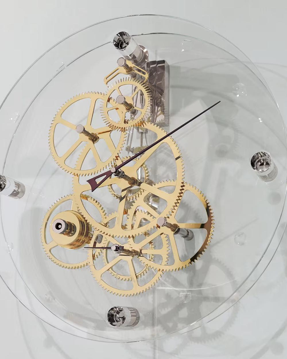 Presto wall pendulum clock designed by Gianfranco Barban for Teckell is a part of Takto timepieces collection. This gorgeous timepiece is the modern definition of time. The Graham escapement is visible within the two crystal disks that make up the
