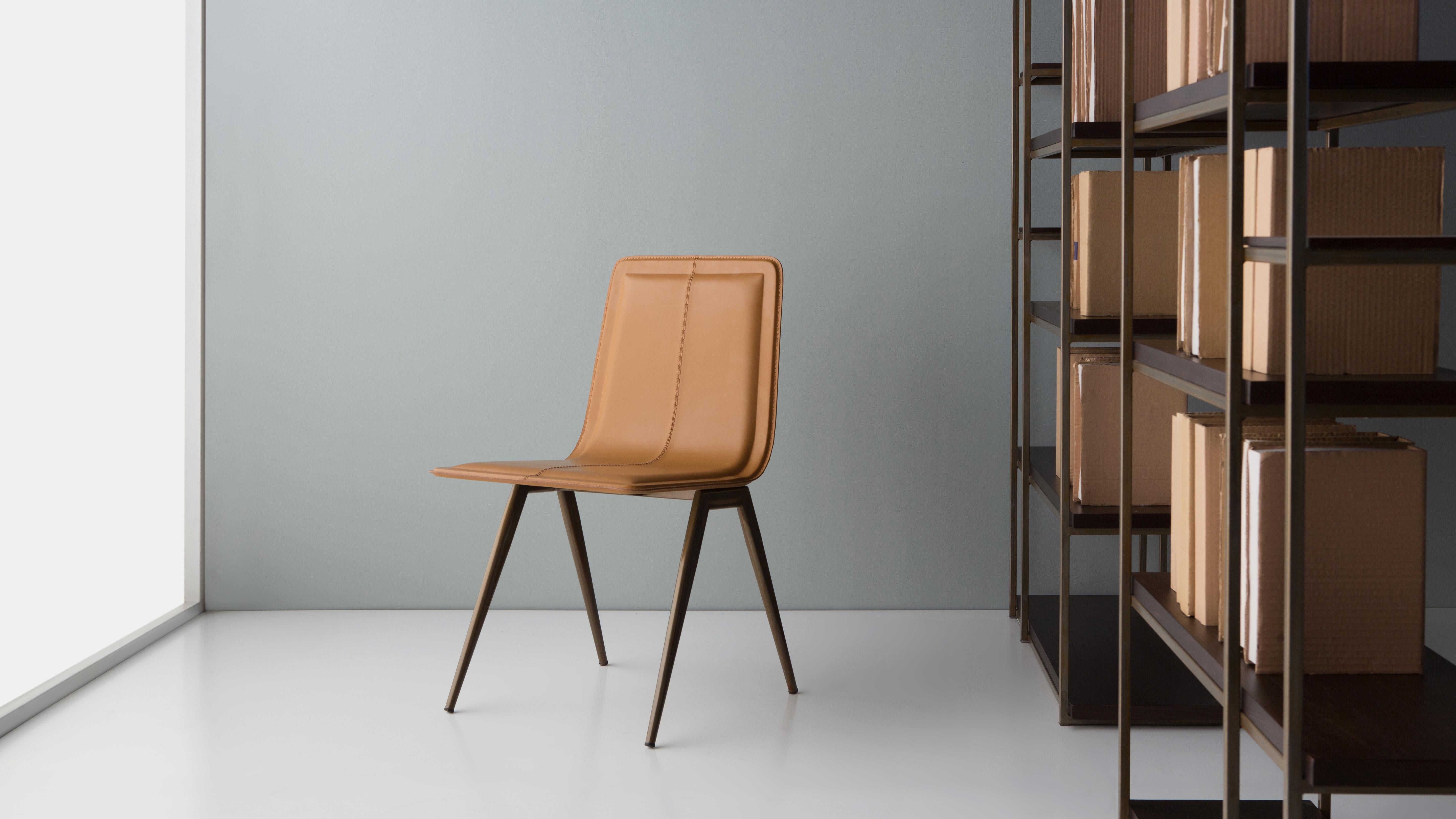 Tecno Chair by Doimo Brasil
Dimensions: W 46 x D 55 x H 83 cm 
Materials: Veneer, Natural Leather.


With the intention of providing good taste and personality, Doimo deciphers trends and follows the evolution of man and his space. To this end, it
