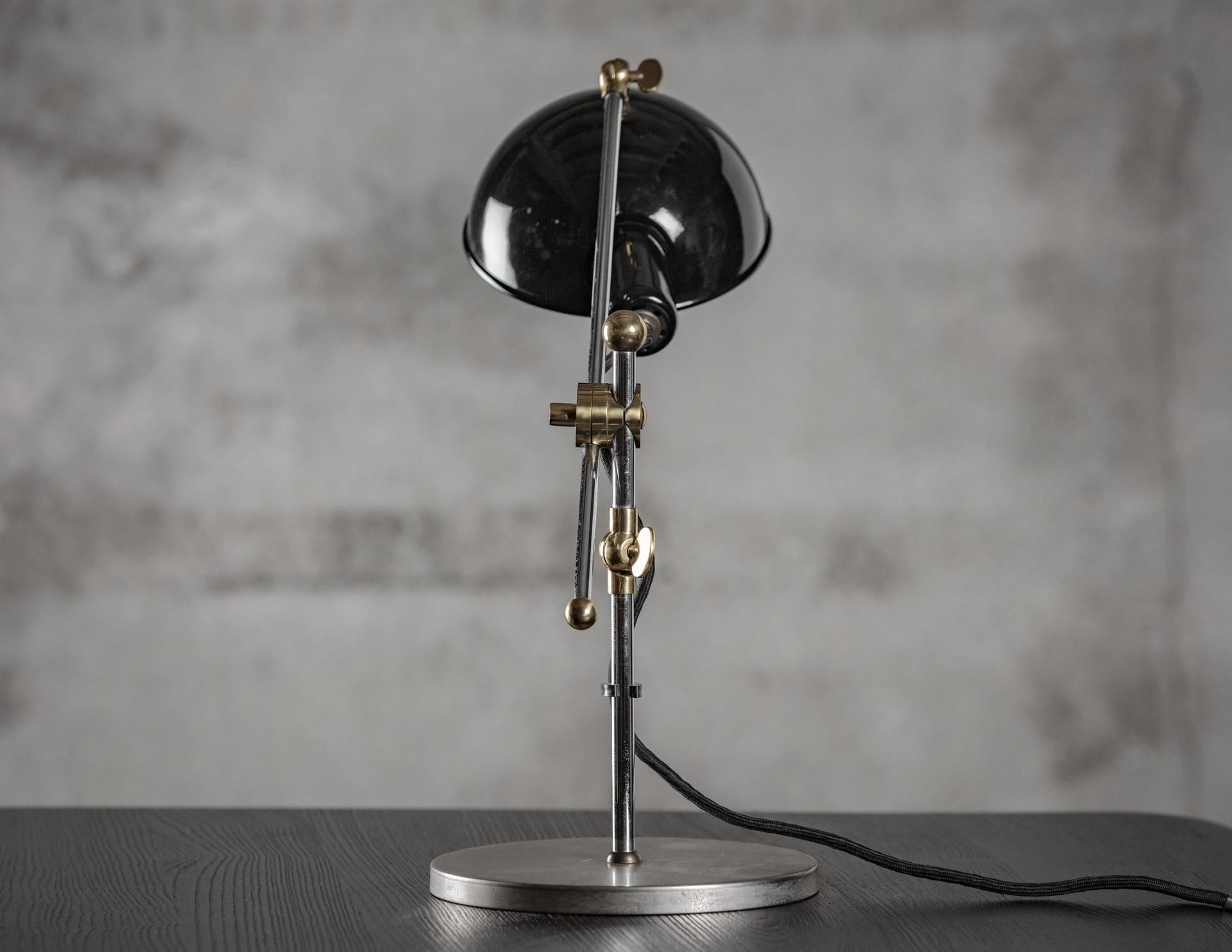 Germany: Walter Schnepel; Tecnolumen adjustable desk lamp, Model SF27, circa 1990

This lamp was originally designed in Sweden in 1927, but the designer is unknown. It was brought to Germany by Walter Schnepel.