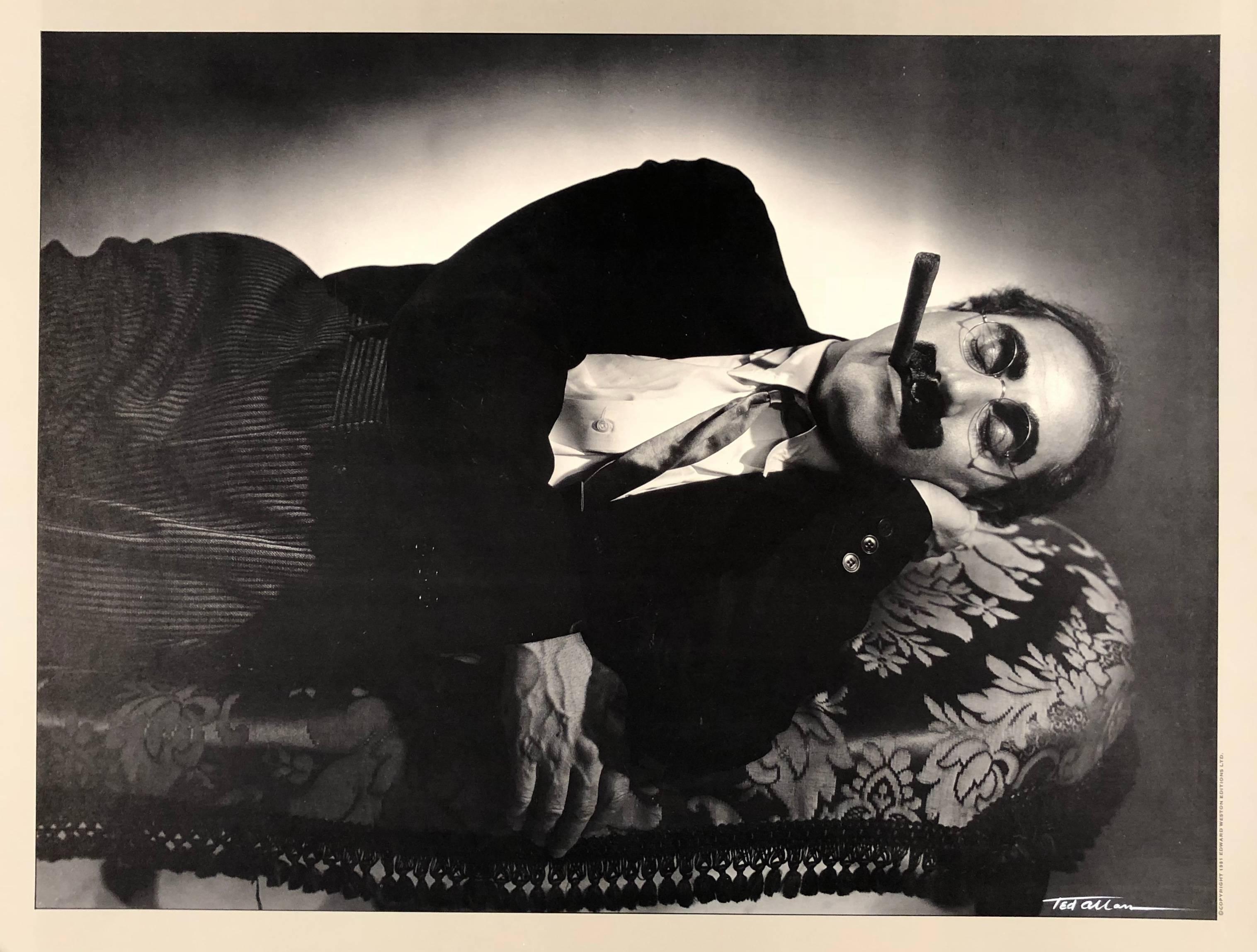 This piece is a photolithograph from the original negative by Ted Allan, originally shot in 1935 and printed at a later date.  It depicts Julius Henry Marx, known professionally as Groucho Marx, who was an American comedian, writer, stage, film,