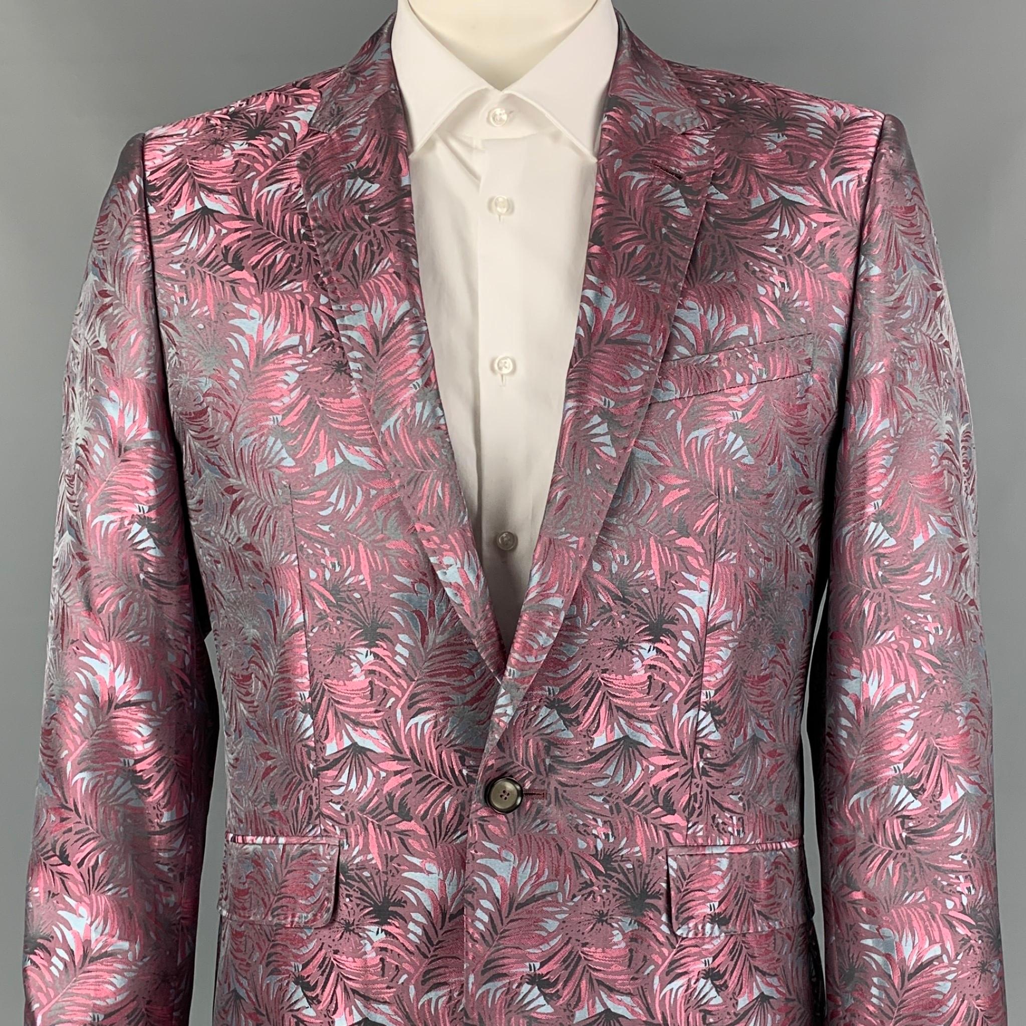 TED BAKER sport coat comes in a pink & steel blue jacquard polyester with a full liner featuring a notch lapel, flap pockets, single back vent, and a single button closure. Made in Portugal. 

Very Good Pre-Owned Condition.
Marked: 42