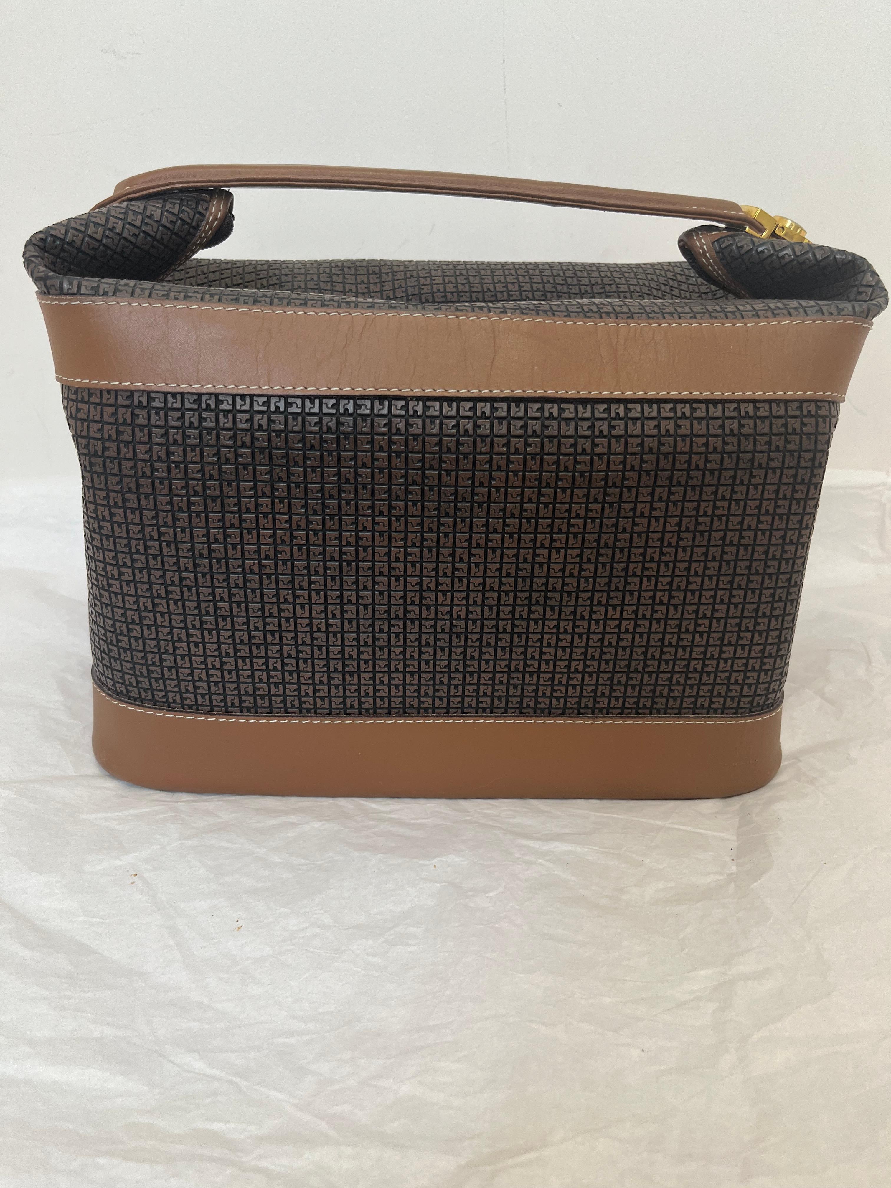 In great condition this vintage Ted Lapidus case can store your items, use it for cosmetics or it makes an excellent travel case.
Ted Lapidus was a well known French designer who, in the 60s, designed a bag for the Beatles. Oliver, his son, is now