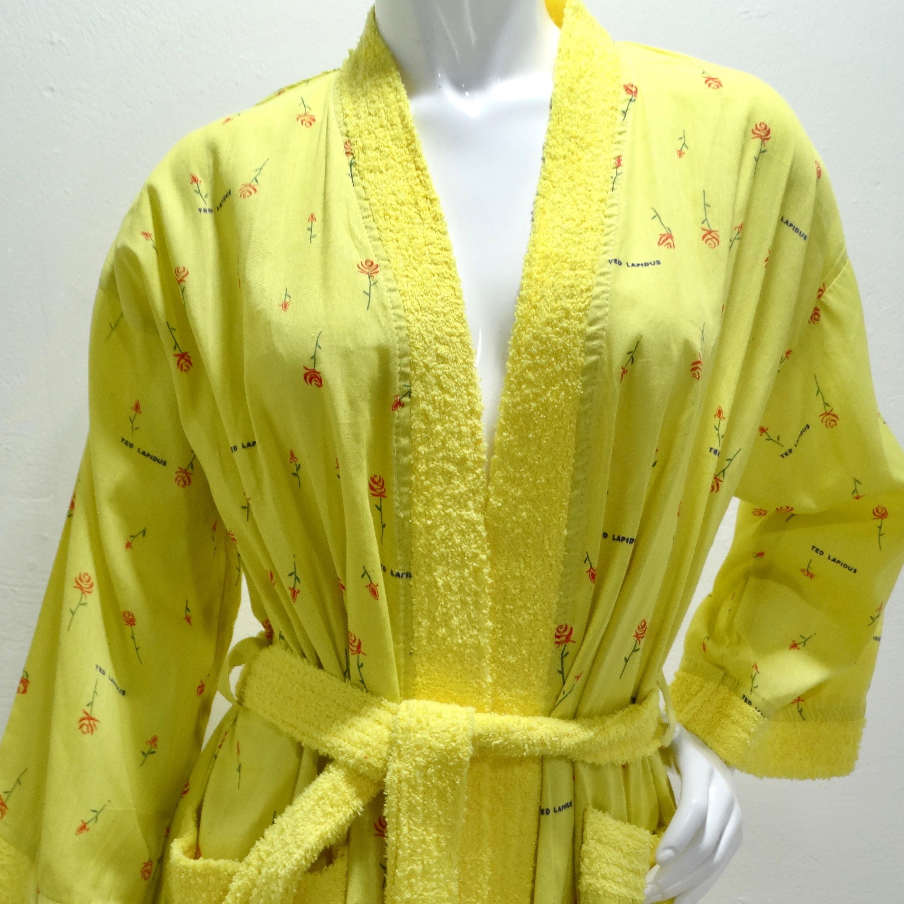The Ted Lapidus 1980s Rose Print Robe sounds like a delightful and versatile addition to any wardrobe, with its vibrant yellow color and whimsical rose print.

The bright yellow hue of the robe adds a cheerful and sunny touch to any ensemble, making