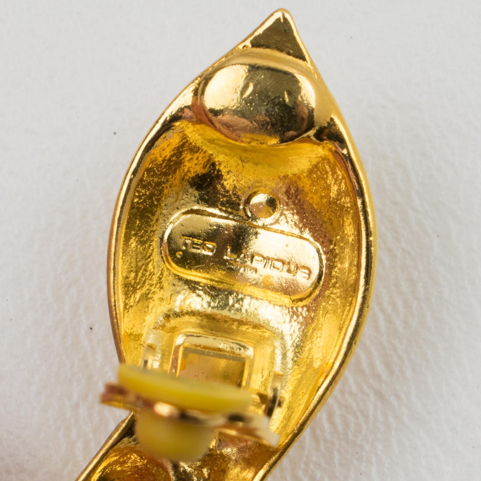 Femenino o masculino Pendientes de clip con voluta de metal dorado Ted Lapidus Paris en venta