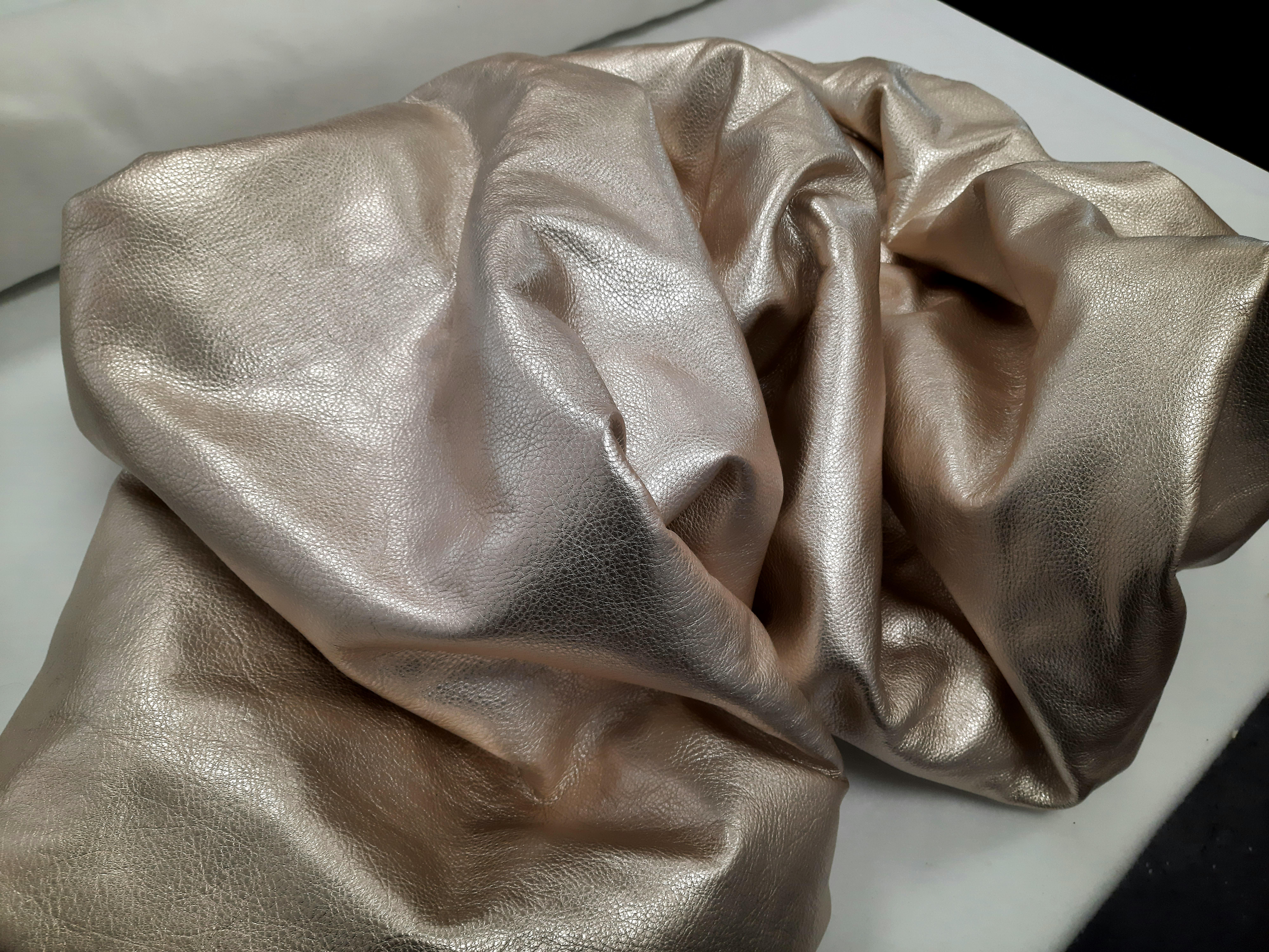 Drape Champagne 114 (folds pop slick metallic smooth leather wall sculpture art) - Sculpture by Ted VanCleave