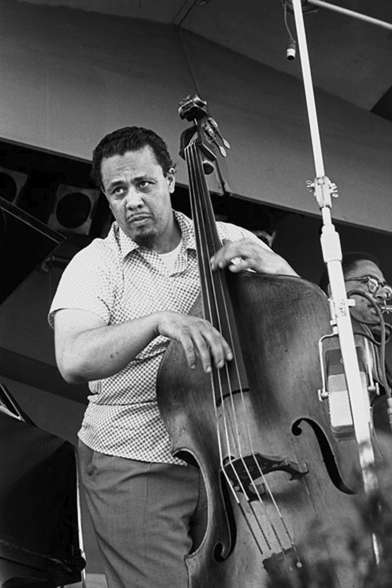 Estate-stamped, gelatin-print silver

Charles Mingus On-stage at the Newport Jazz Festival, Rhode Island, 1959

Available sizes: 
20”x16" Edition of 25
24”x20" Edition of 25
40”x30" Edition of 25
60”x40” Edition of 25

This photograph will be