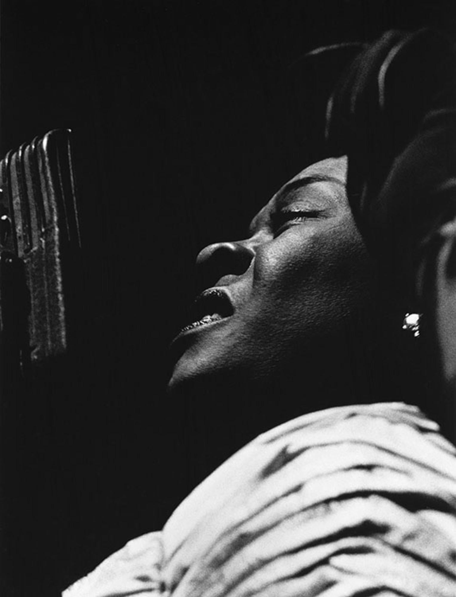 Title: Dinah Washington, Civic Opera House, Chicago, IL

Estate-stamped, gelatin-print silver

American singer and pianist, Dinah Washington on stage at Civic Opera House, Chicago, IL, US, 1956.

Available sizes: 
20”x16" Edition of 25
24”x20"