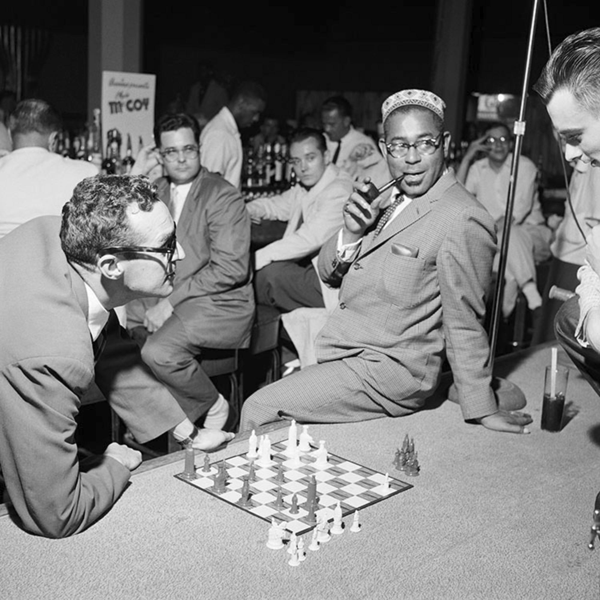 Estate-stamped, gelatin-print silver

Canadian music critic, biographer, lyricist and former journalist Gene Lees playing chess with American jazz trumpeter and bandleader, Dizzy Gillespie.

Available sizes: 
16”x20" Edition of 25
20”x24" Edition of