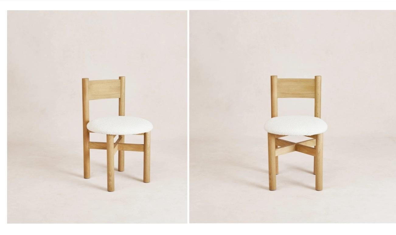 The Teddy Dining Chairs from House of Léon have sturdy frames with a wide comfortable seat. The frame is made from solid white oak with a rounded white oak veneer backrest.

The acrylic boucle fabric is perfect for dining areas as the material,