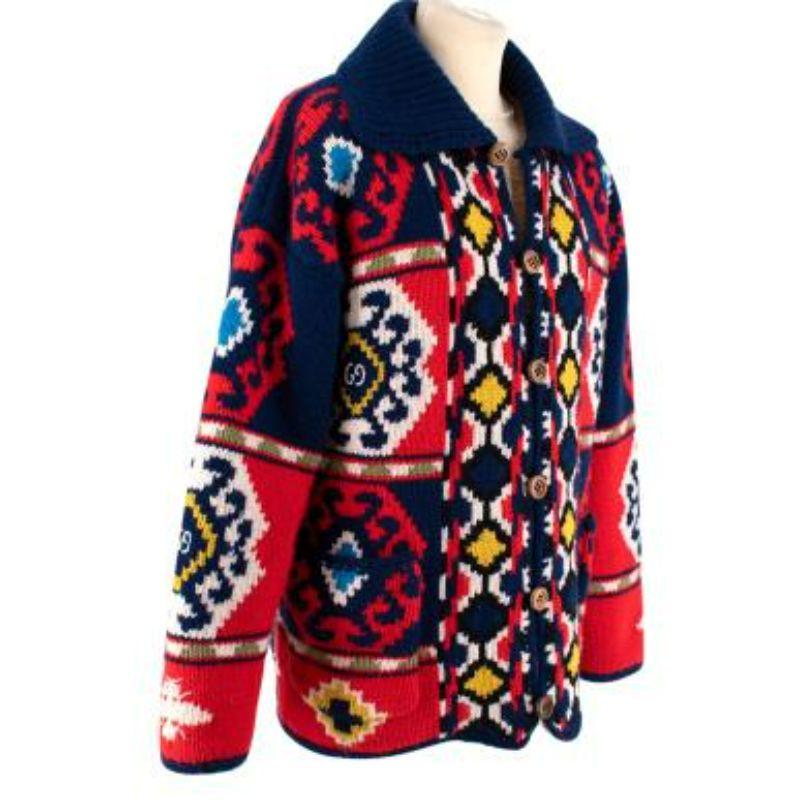 Gucci Teddy Lined Red and Navy Knitted Cardigan
 
 
 
 - Heavy weight, chunky knit body 
 
 - Tonal shape knit pattern 
 
 - Over sized
 
 - Lapel collar 
 
 - Long sleeve
 
 - Patch pockets 
 
 - Front button stand 
 
 - Fully lined with brown
