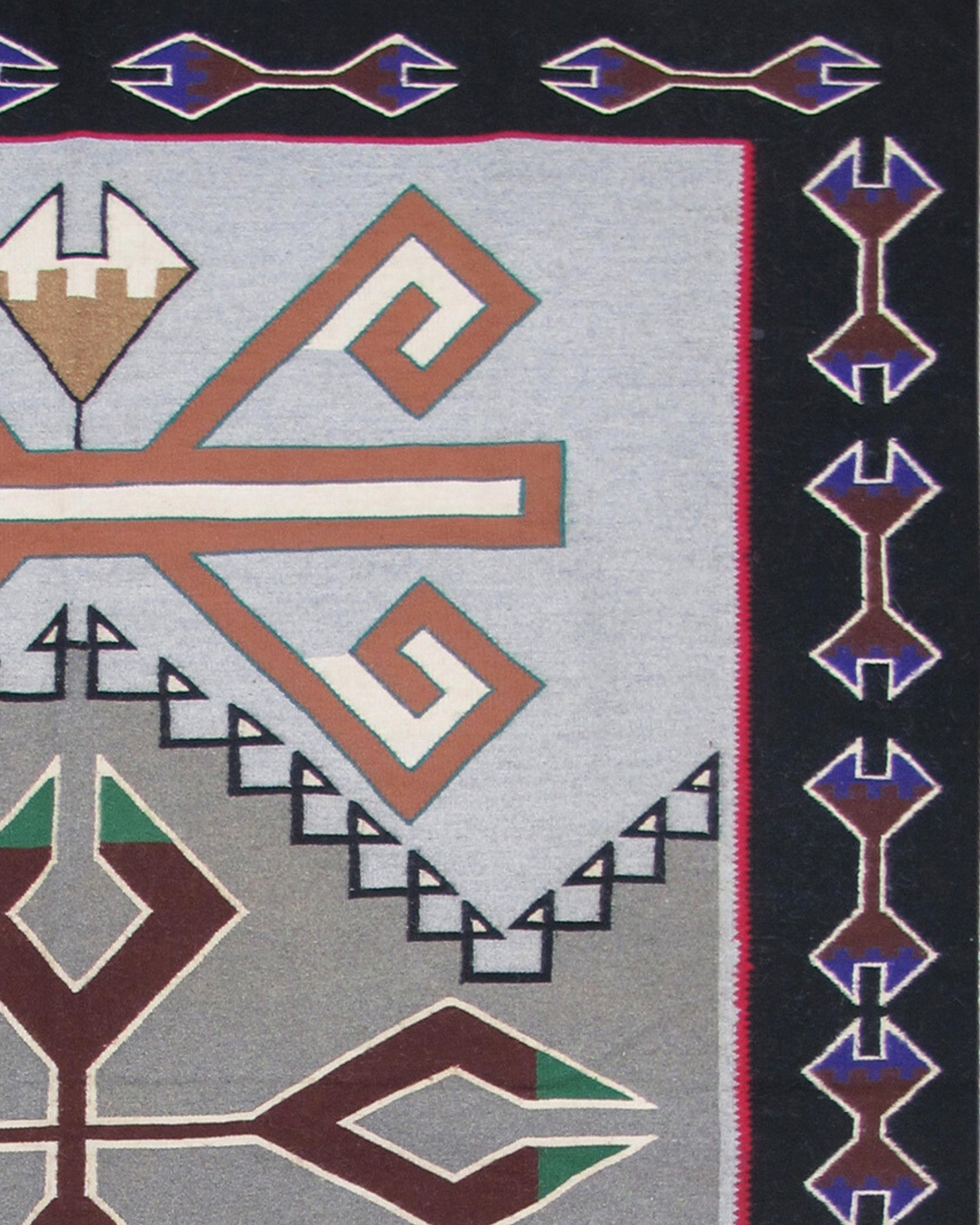 Teec Nos Pos Navajo-Teppich von Ruth Yabeny, 20. Jahrhundert

Den meisten Berichten zufolge sind die Navajo die produktivsten Weber der amerikanischen Ureinwohner. Während die Ureinwohner des Südwestens schon seit Generationen mit verschiedenen