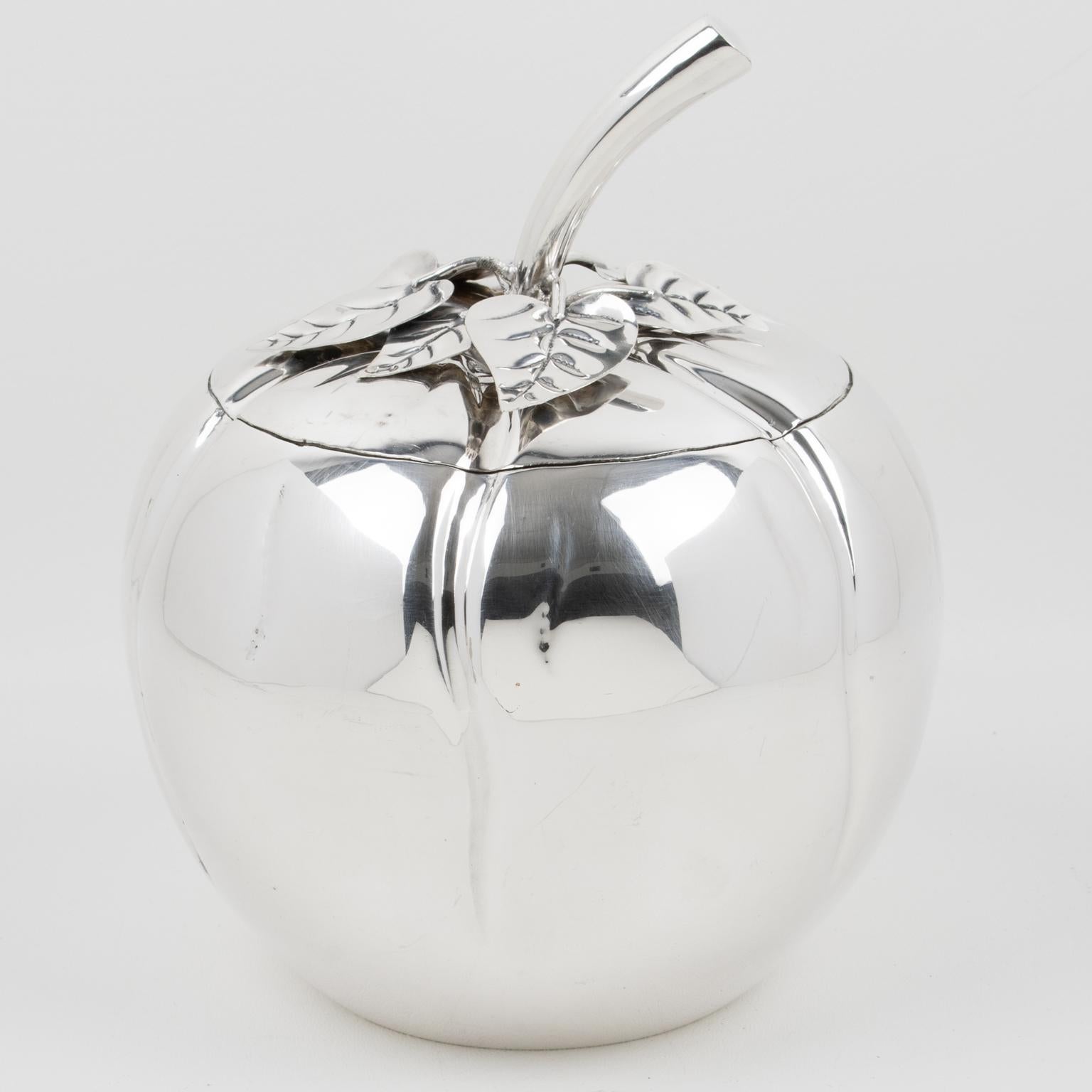 Designed by the esteemed Teghini Firenze circa 1980, this exceptional modernist silver plate ice bucket is both a functional barware staple and a striking statement piece. Its elegantly rounded form is elevated by an oversized stylized tomato