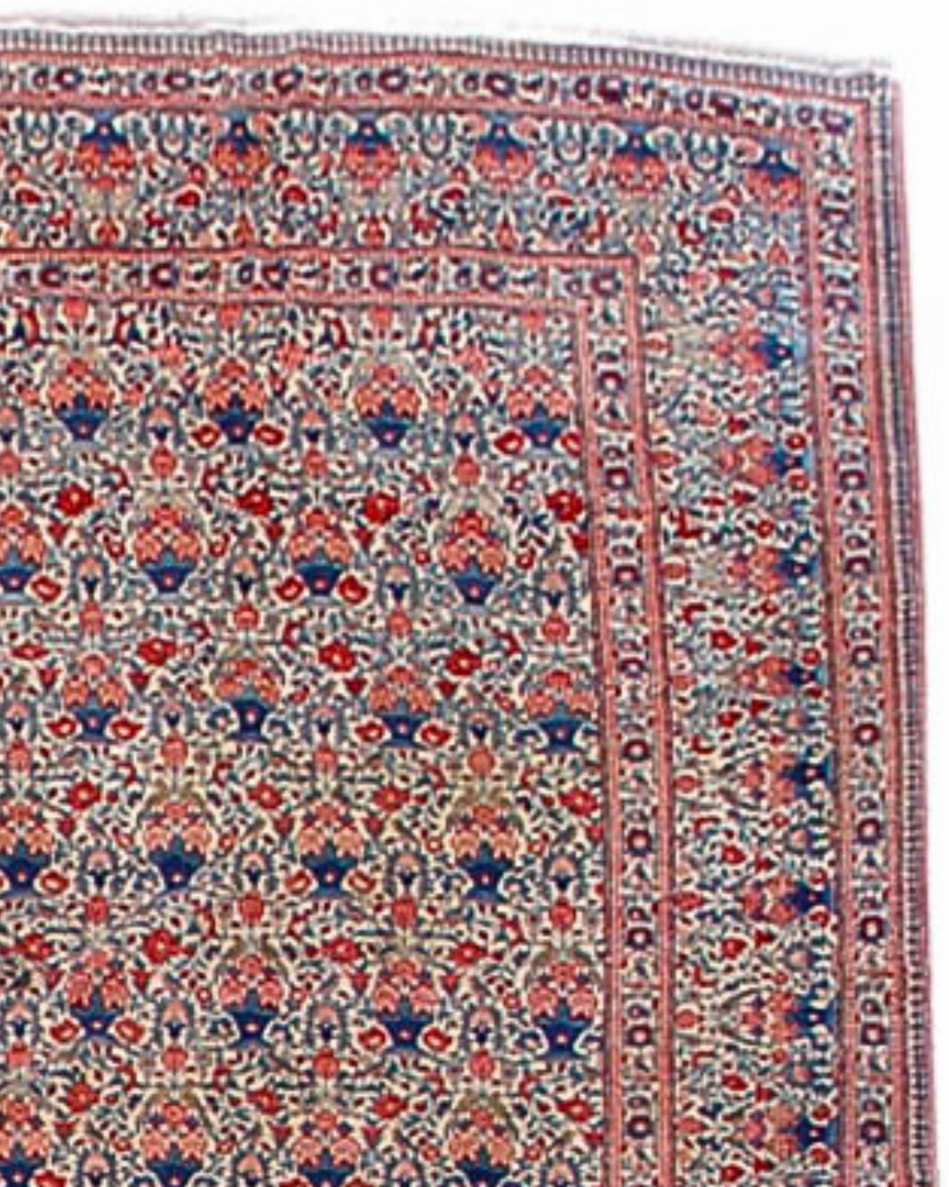 Antique Persian Tehran Rug, Early 20th Century

This elegant carpet was woven in the vicinity of the Persian capital city of Tehran. Both the ivory field and borders are filled with clusters of potted flowering roses, a flower that has a special