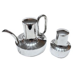 Silver teapot and sugar bowl