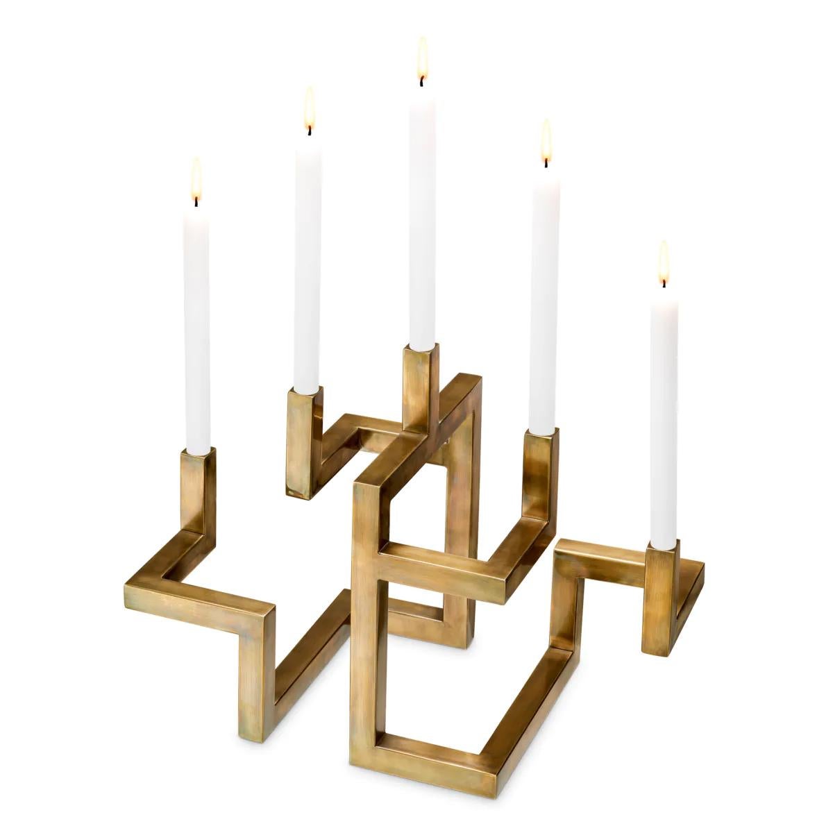 Candelabro Teka Latón con estructura de acero inoxidable
en acabado latón vintage, para 5 velas, velas no incluidas.