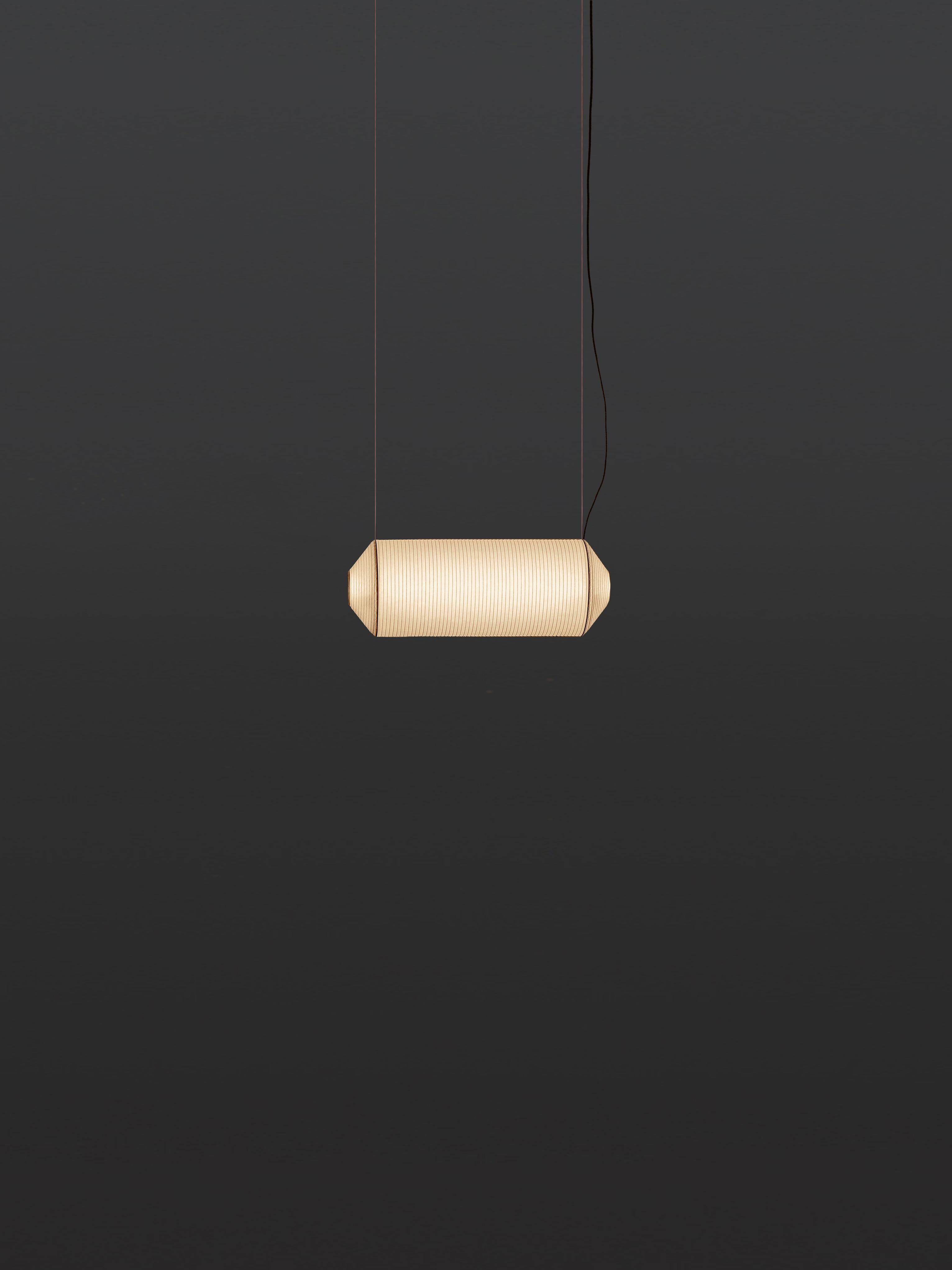 Tekiò Horizontal P1 pendant lamp by Anthony Dickens
Dimensions: D 25 x W 67 x H 25 cm
Materials: Metal, Washi japanese paper shade.
Available in circular or rectangular canopy.

Tekiò, the Japanese word for adaptation, merges ancient artisan