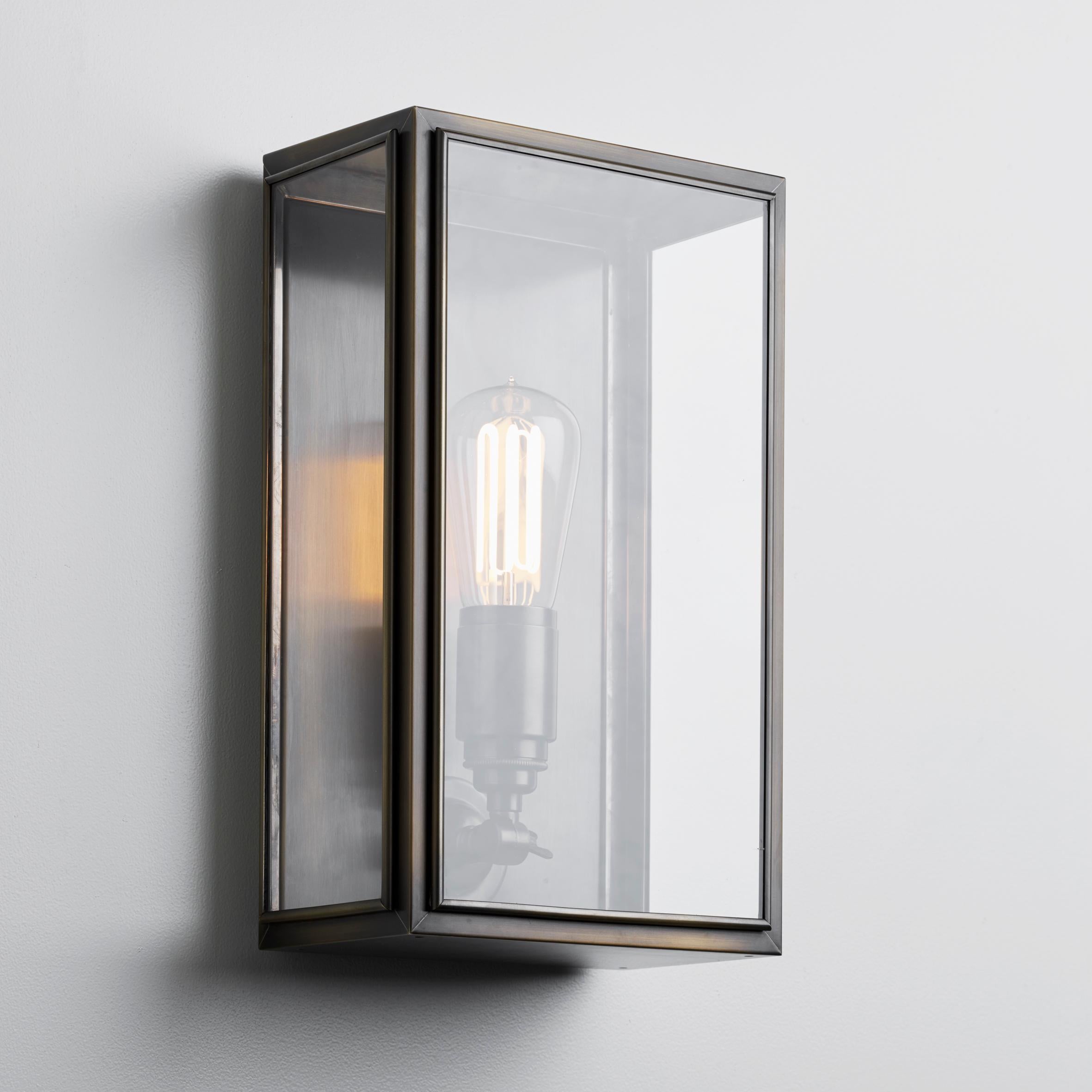 Wall light in brass lacquered in color with outside fitted clear or frosted glass and spring closure. For indoor and outdoor use (IP44).

Caret squirrel cage lamp 230V E27 7,7W 2300K. Main power 230V 50Hz.