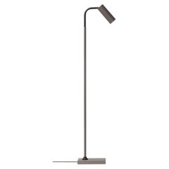 Lampada da lettura Tekna Gio Bagnara Marquesse con finitura grigio fango e grigio chiaro