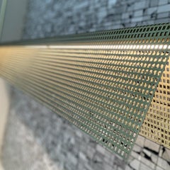 Lampada a sospensione Tekna Hurton con finitura in ottone satinato