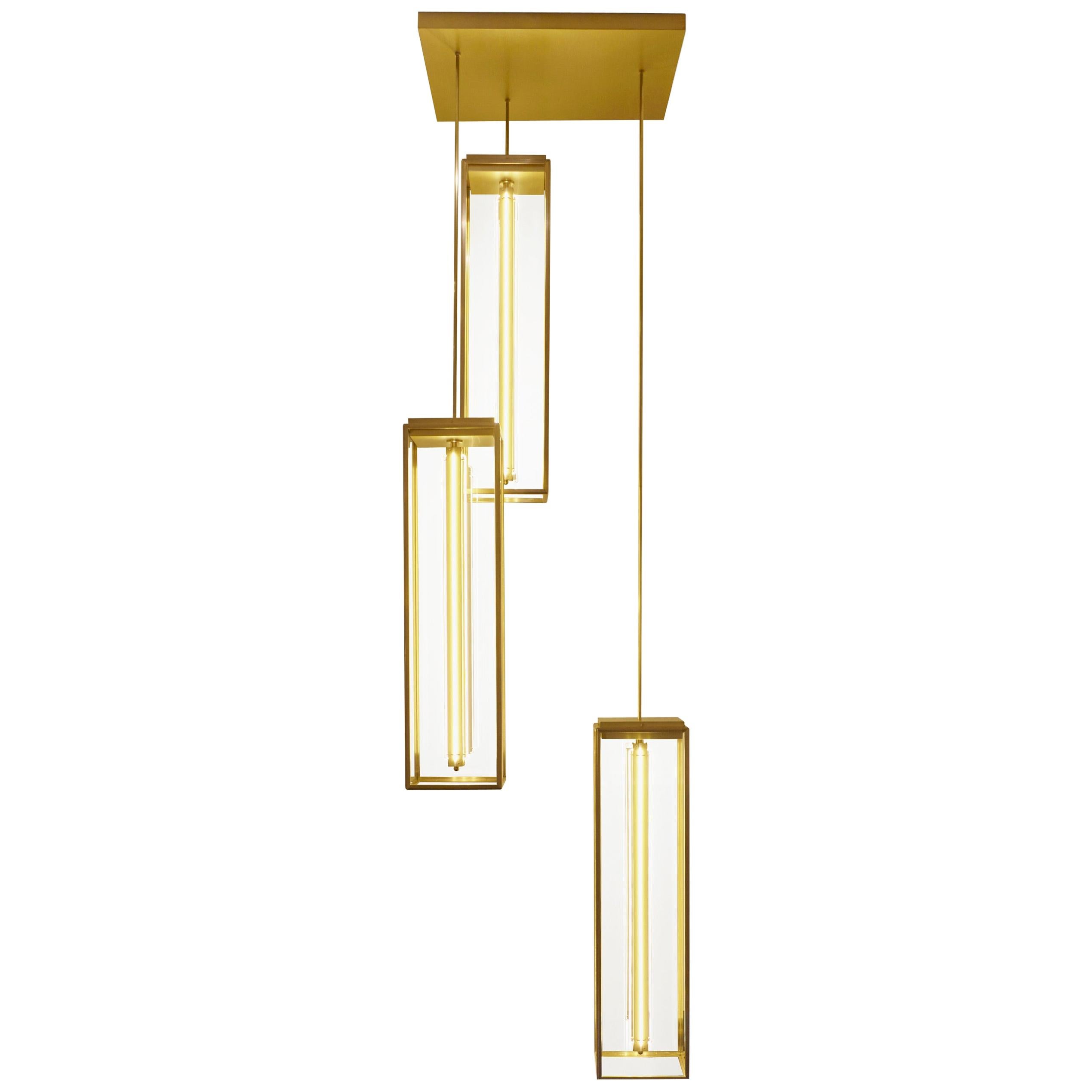 Hanging light in dark bronze with inside fitted clear glass, closed top. With fixed tube (on measure) and ceiling dome (to order separately). Central lamp holder with four cold cathode lamps. For suspension options please inquire about additional