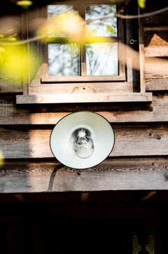 Tekna Quay, lampada da parete a 45° con finitura in rame e vetro trasparente