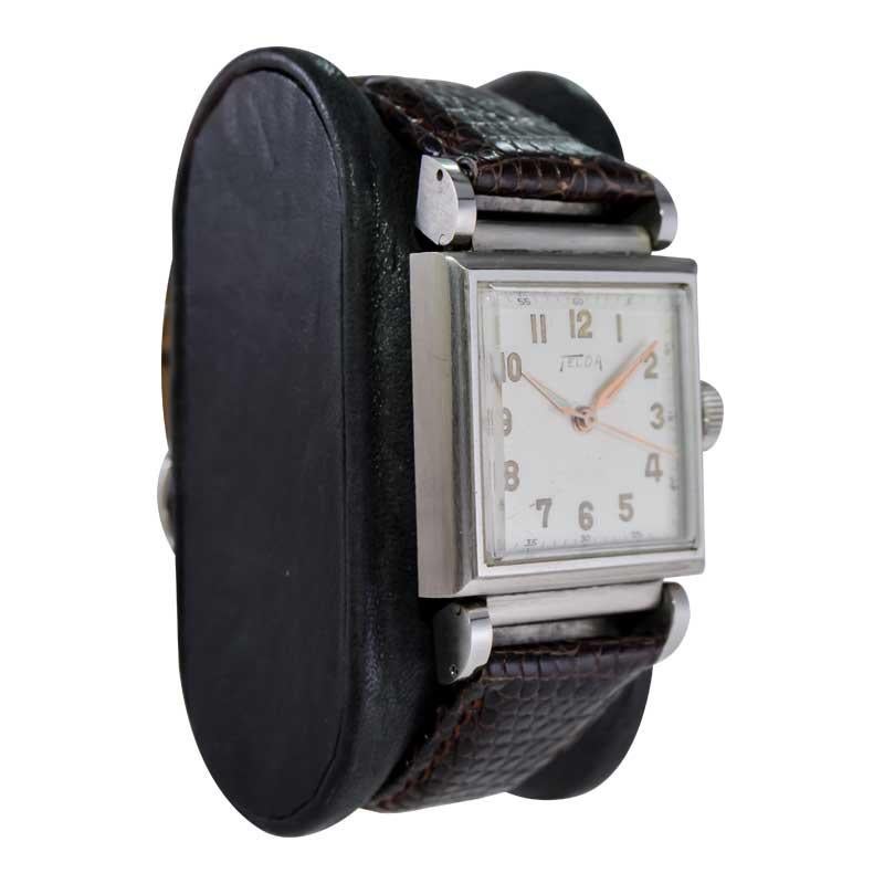 FACTORY / HOUSE: Telda Watch Company
STYLE / REFERENCE: Art Deco / Tank Style 
METAL / MATERIAL: Stainless Steel
CIRCA / YEAR: 1950's
DIMENSIONS / SIZE: Length 40mm X Width 28mm
MOVEMENT / CALIBER: Manual Winding / 17 Jewels 
DIAL / HANDS: Original