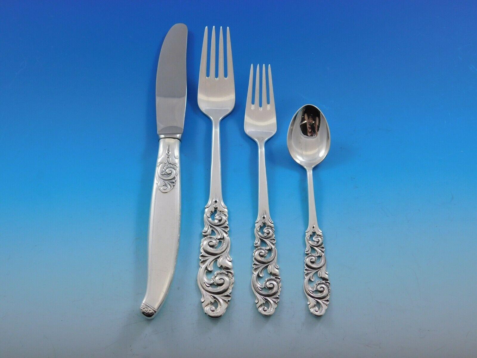 Scarce Tele by Mylius Brodrene 830 silver Norwegian flatware set, 40 pieces. This rare set features ornate pierced handles and includes:

8 knives, 8 1/4
