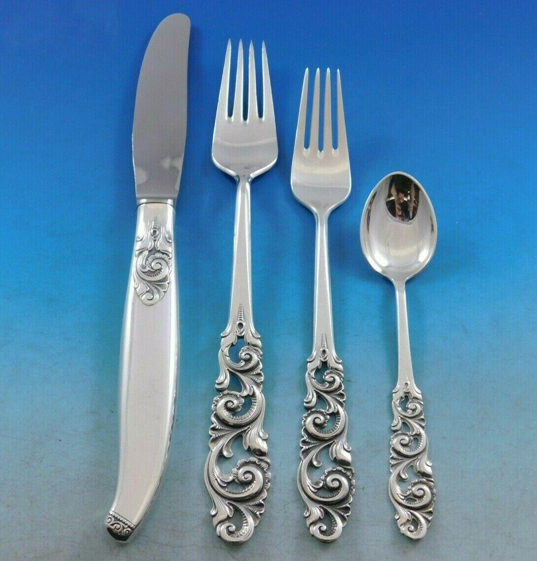 Monumental Tele by Mylius Brodrene 830 silver Norwegian flatware set, 97 pieces. This rare set features pierced handles and includes:

12 Dinner knives, 8 3/4