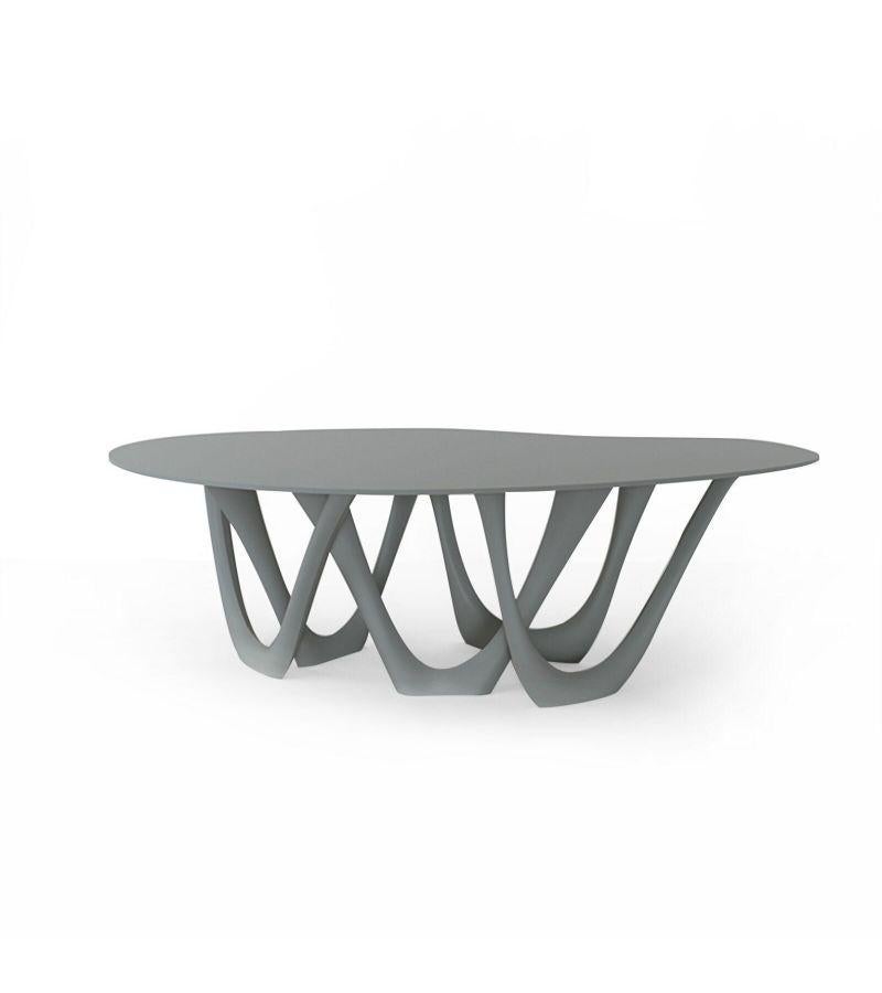 Tele grey steel G-table by Zieta
Dimensions: D 110 x W 220 x H 75 cm 
Material: Carbon steel. 
Finish: Powder-Coated.
Available in colors: Beige, Black/Brown, Black glossy, Blue-grey, Concrete grey, Graphite, Gray Beige, Gray-Blue, Moss Grey, Olive