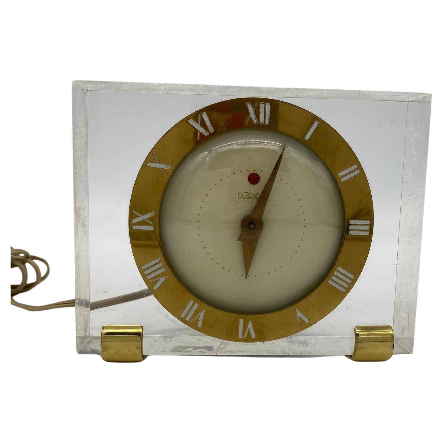 Horloge de bureau électrique Telechron modèle 7H141 en lucite et laiton